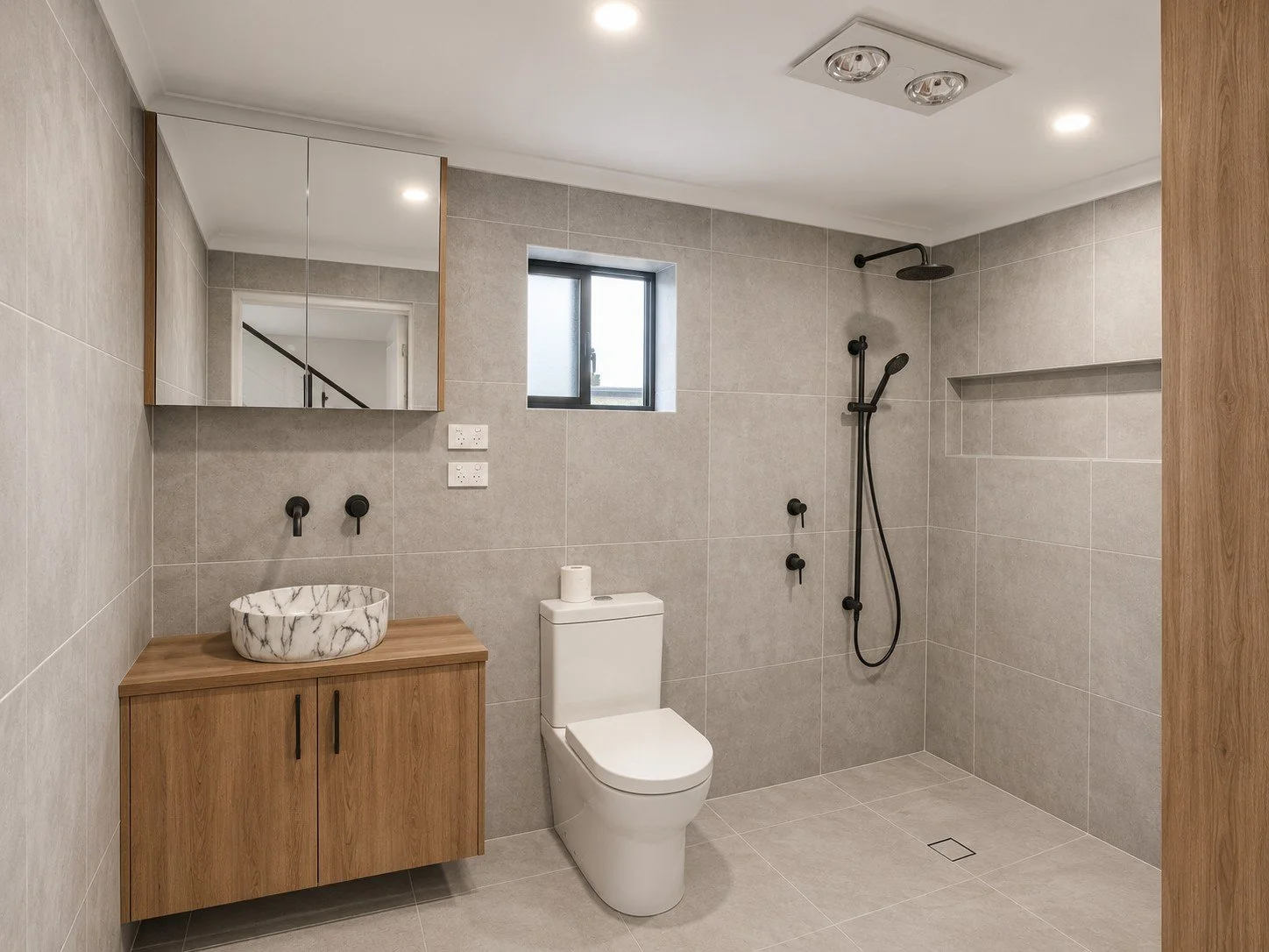 Custom Australian Native timber bathroom vanity with integrated storage.