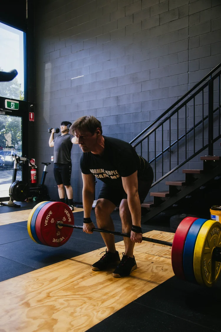 Athlete performing a deadlift at Crucible Strength