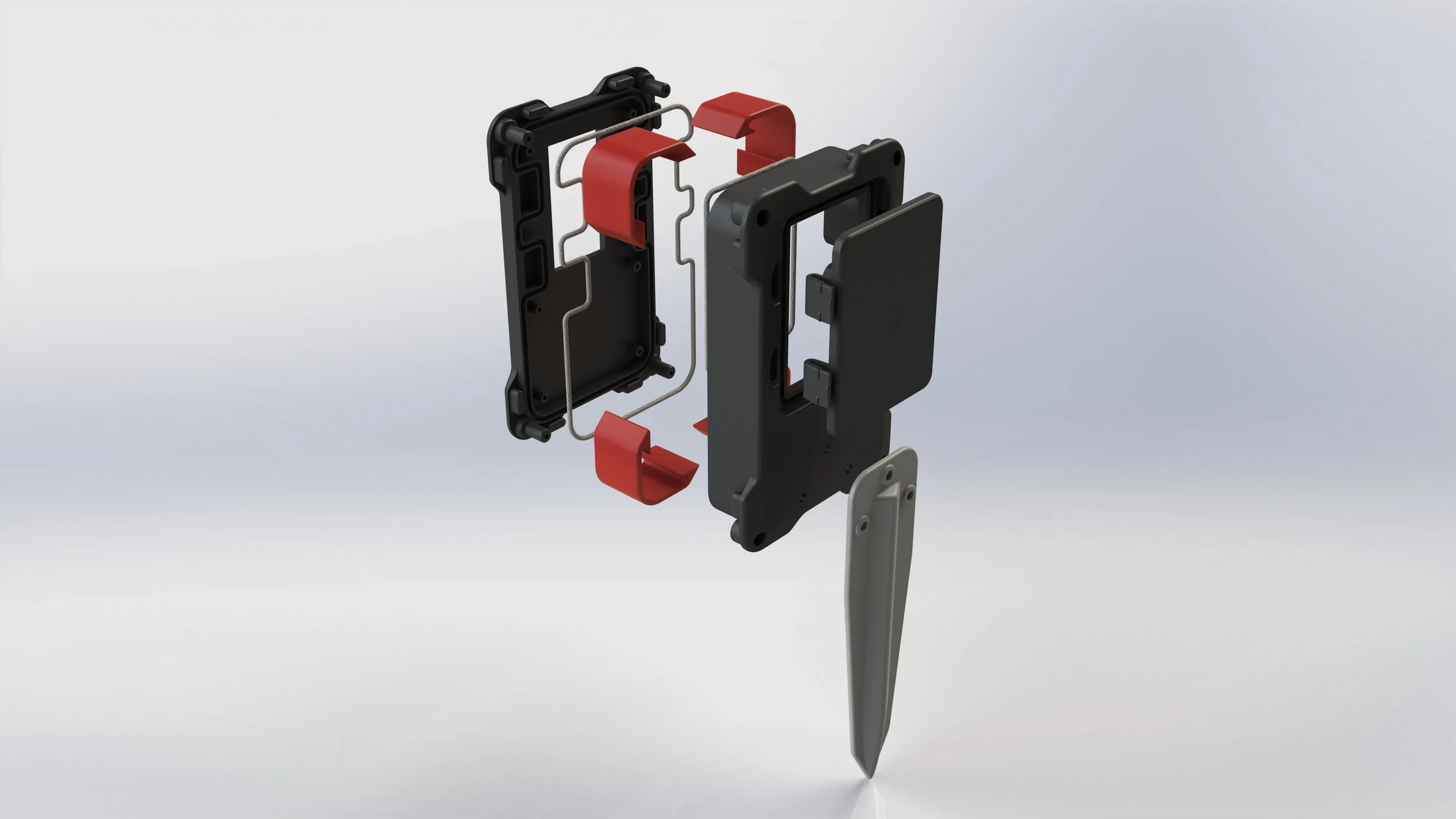 Disassembled electronic device parts with black, red, and gray components, arranged vertically on a stand.