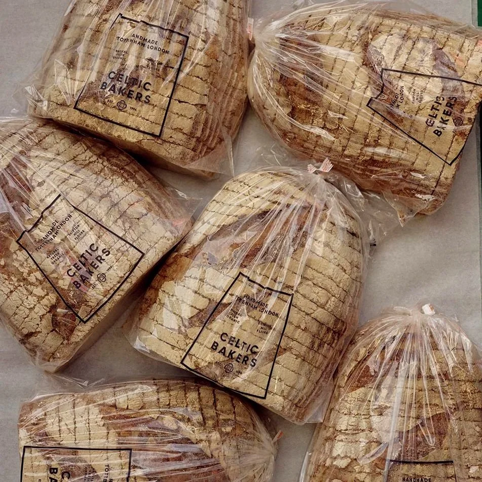 Plastic-wrapped sliced bread with a label that reads 'Celtic Bakers' and 'Handmade in London'.