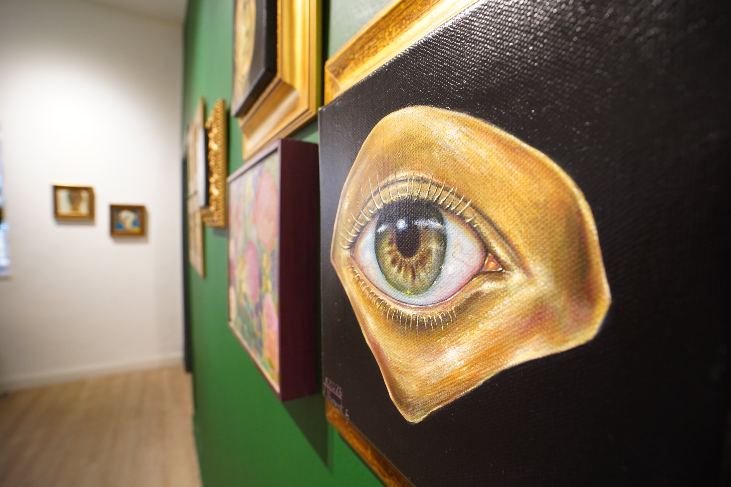   A close-up of a miniature artwork on display at Q0DE Art Space as part of the “Miniatures” group exhibition.   14 July 2026 © Photo by Yasr Abdalla  