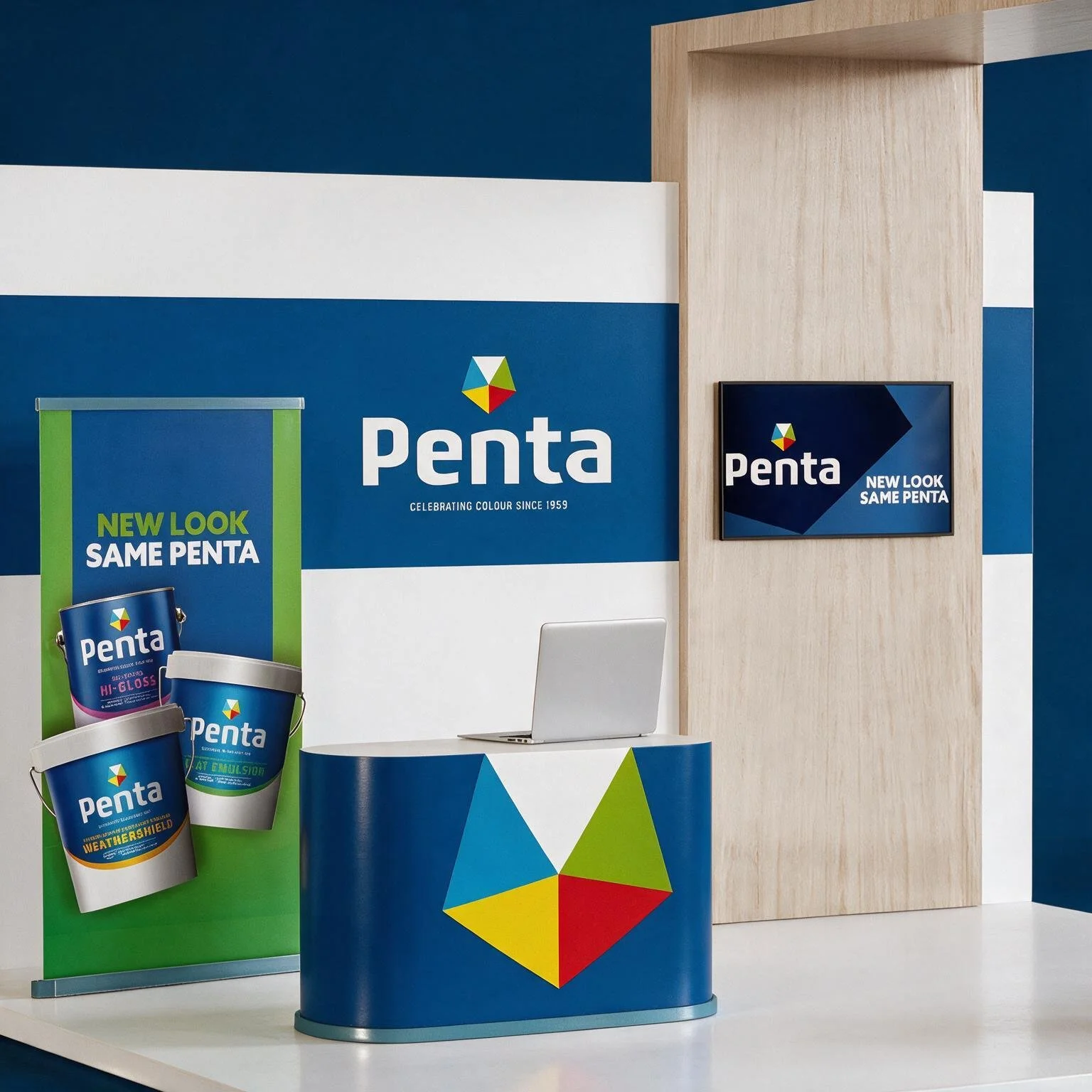 Trade show booth for Penta paint brand with blue, white, green, and red color scheme, featuring logo, promotional banners, paint cans, and a computer.