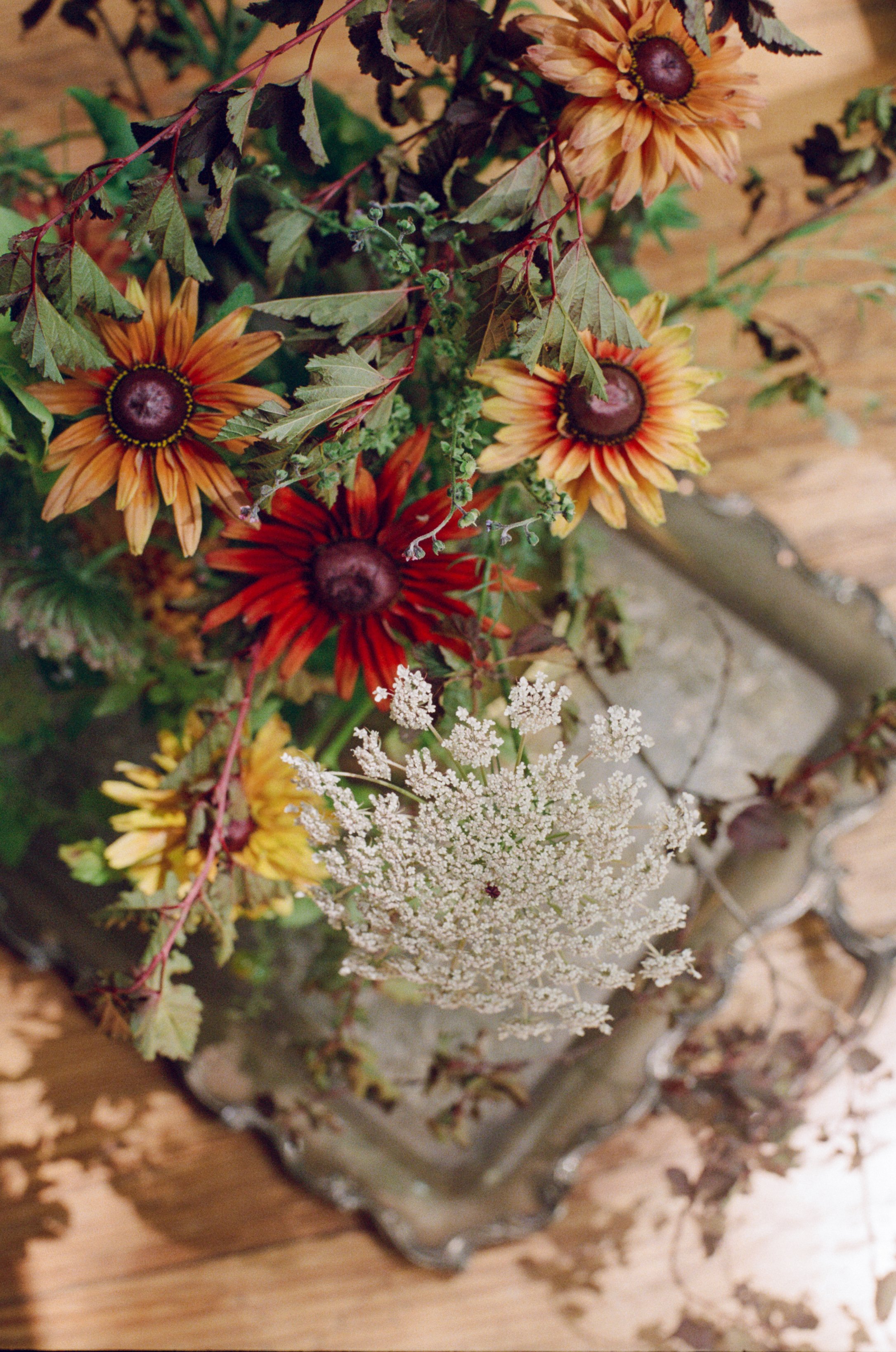 Colorful floral arrangement created for an intimate wedding celebration.