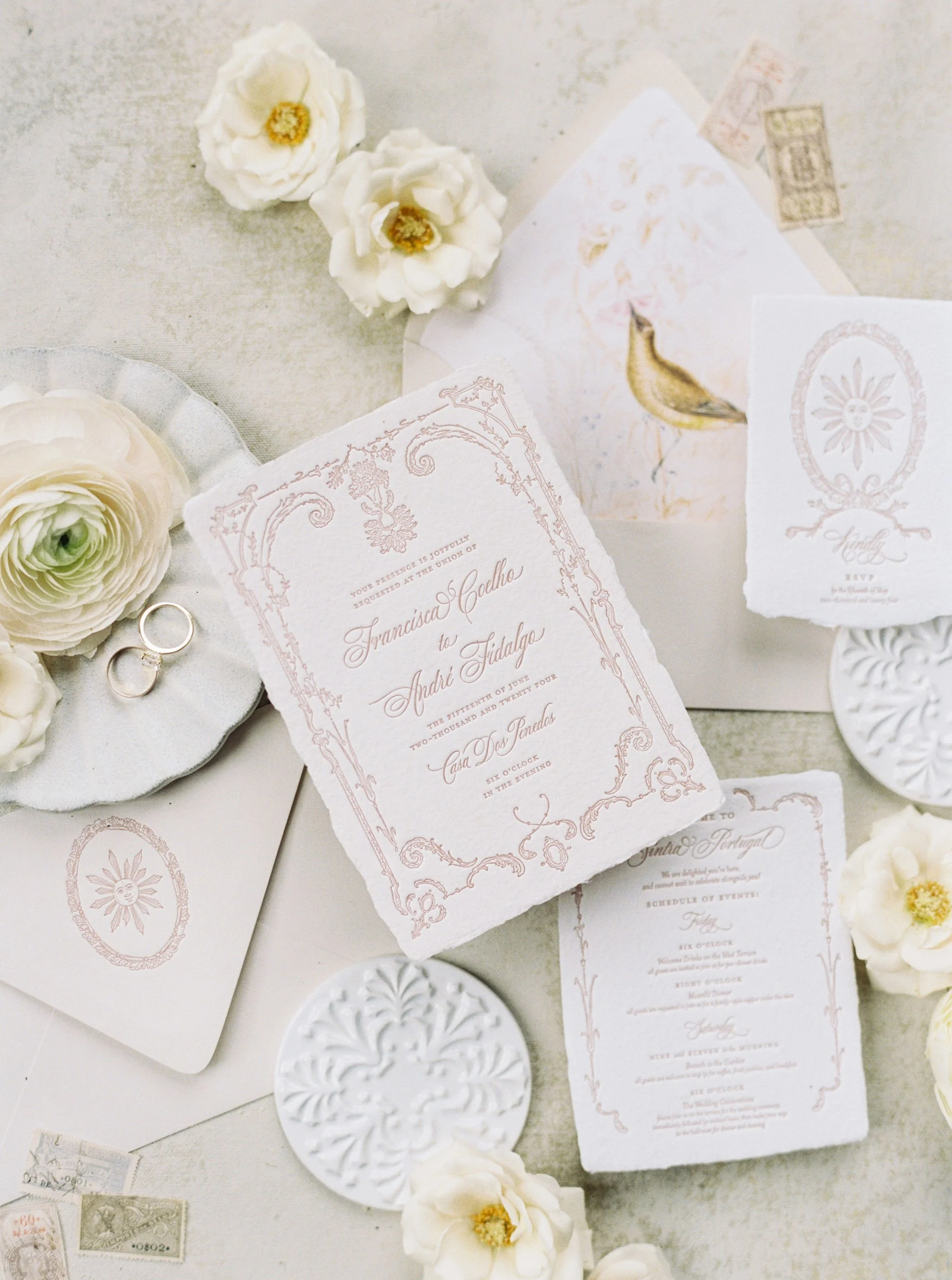 Bespoke wedding invitation suite with custom floral and animal illustrations by Merci Studio.