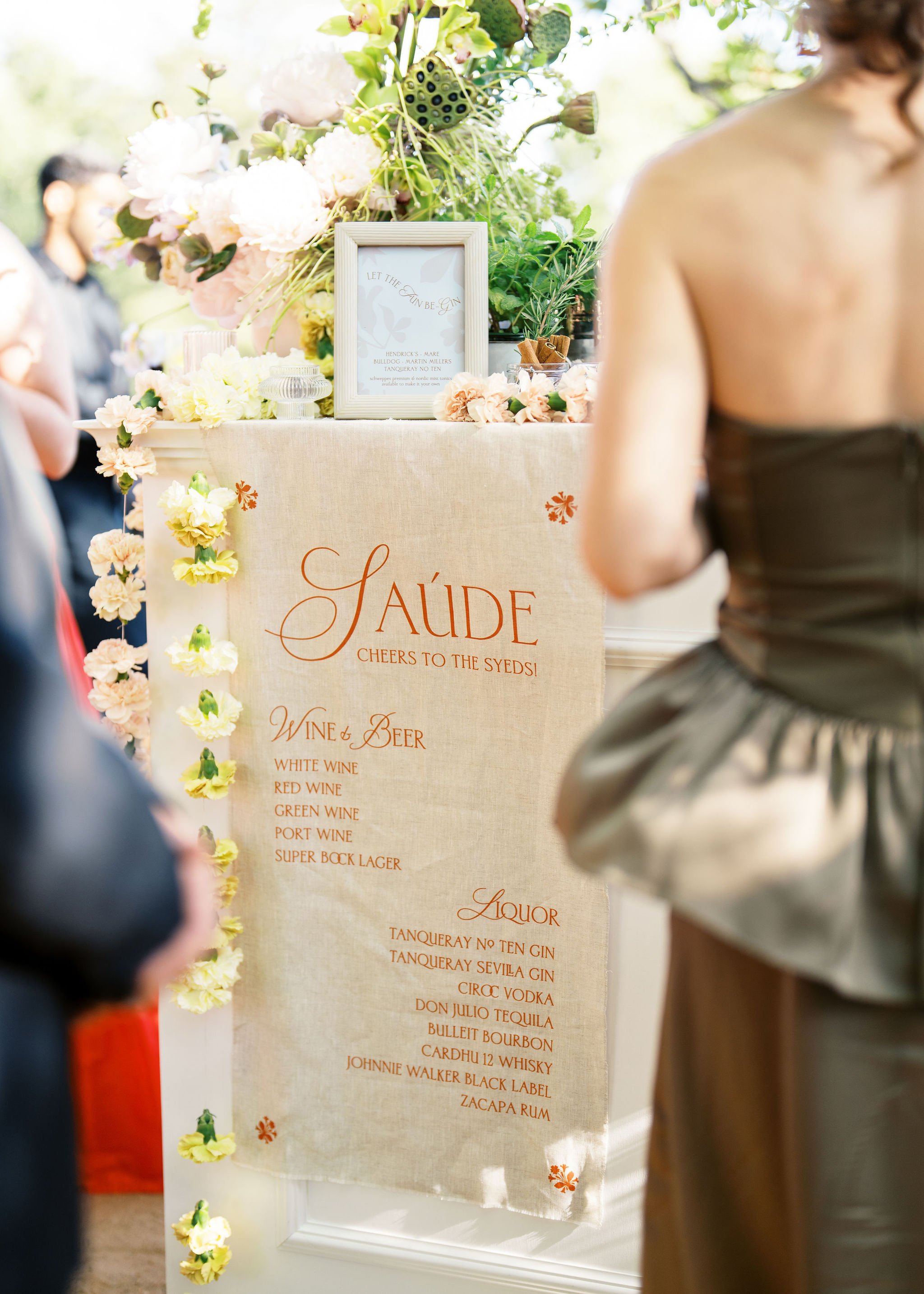 Custom wedding bar menu and signage designed by Merci Studio as part of the event branding.