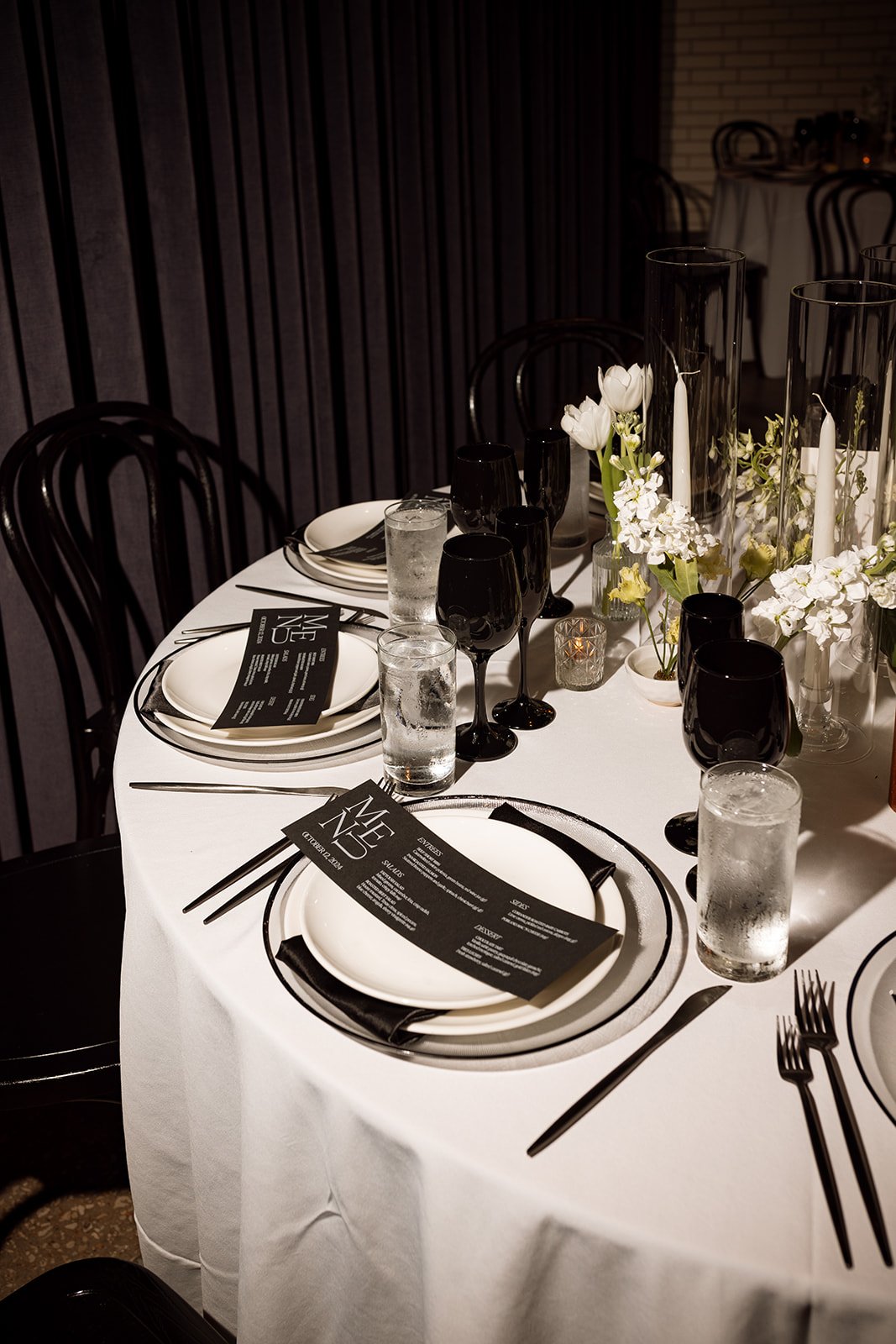 Wedding reception place settings with custom menus designed by Merci Studio for Kristen and Cameron.