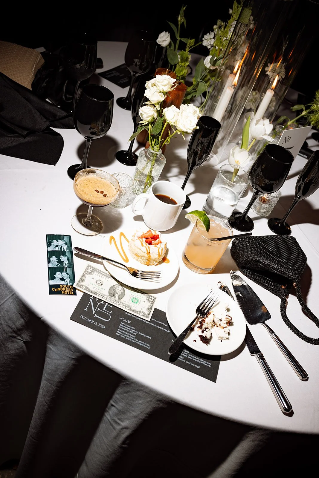 Kristen and Cameron’s Austin wedding reception with custom paper details, florals, candles, and personal keepsakes.