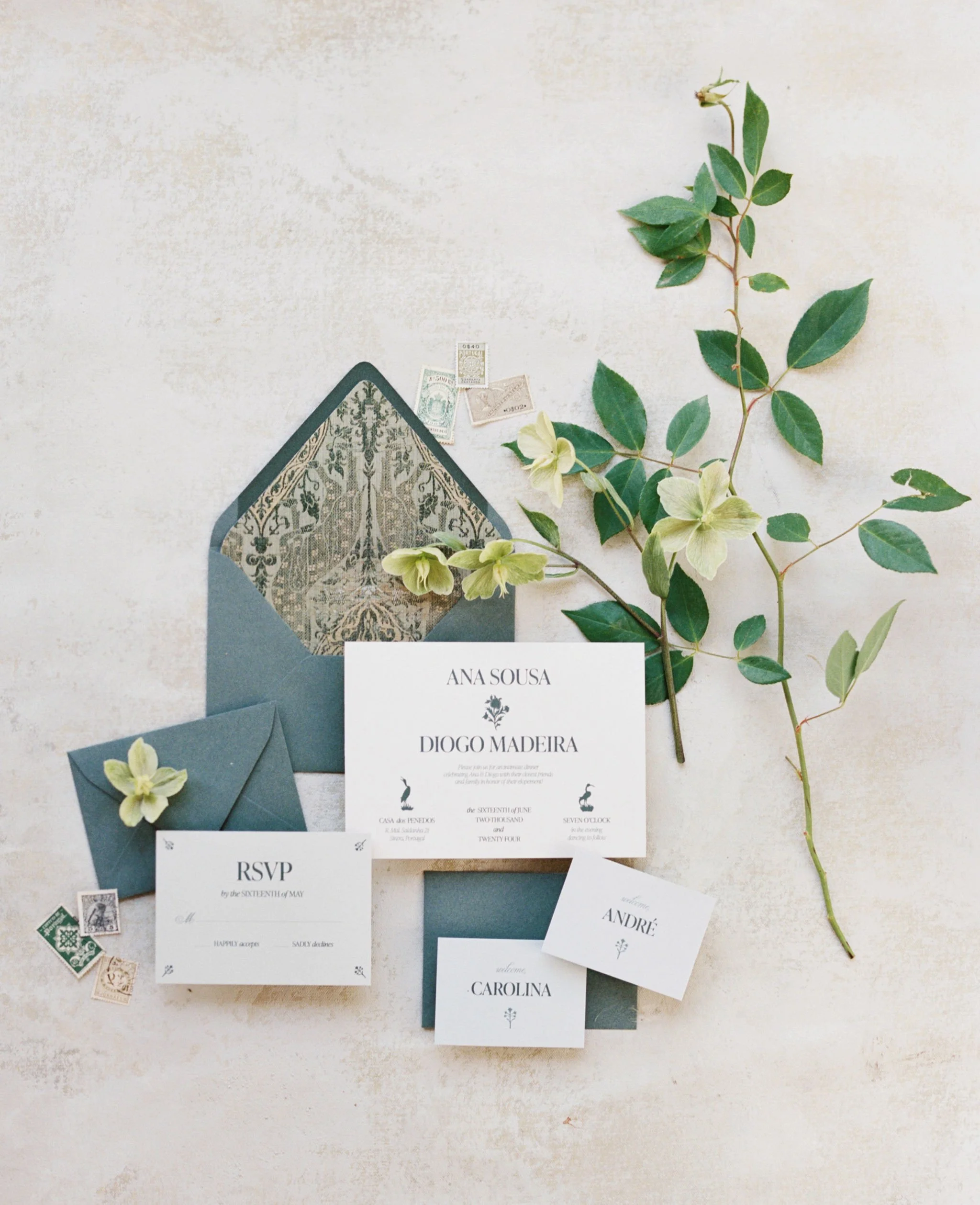 Bespoke wedding invitation suite with custom stationery, RSVP cards, and envelopes by Merci Studio.
