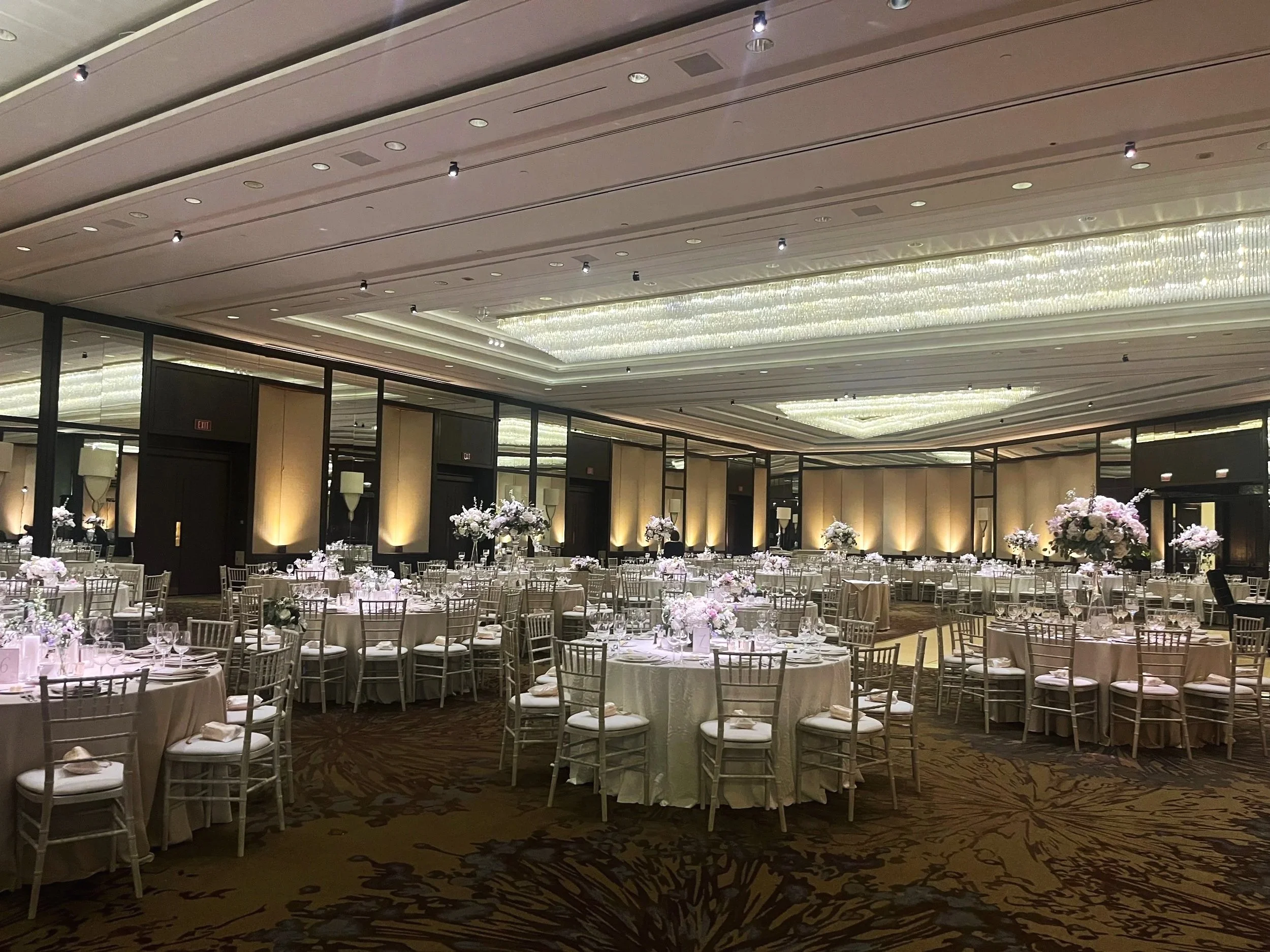 Wedding reception ballroom with warm uplighting at The Westin Pittsburgh