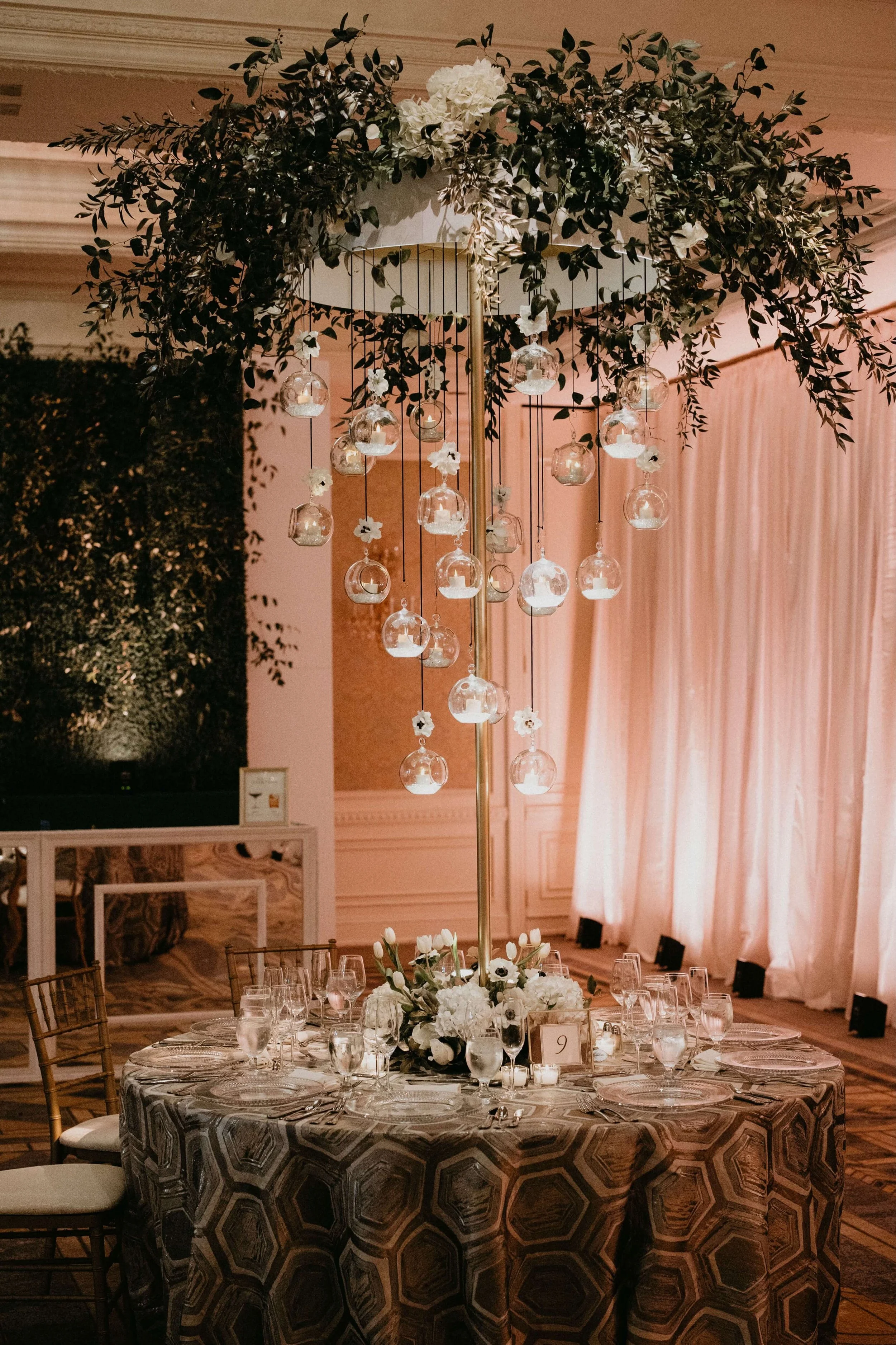Elegant Nemacolin wedding reception with warm wireless uplighting