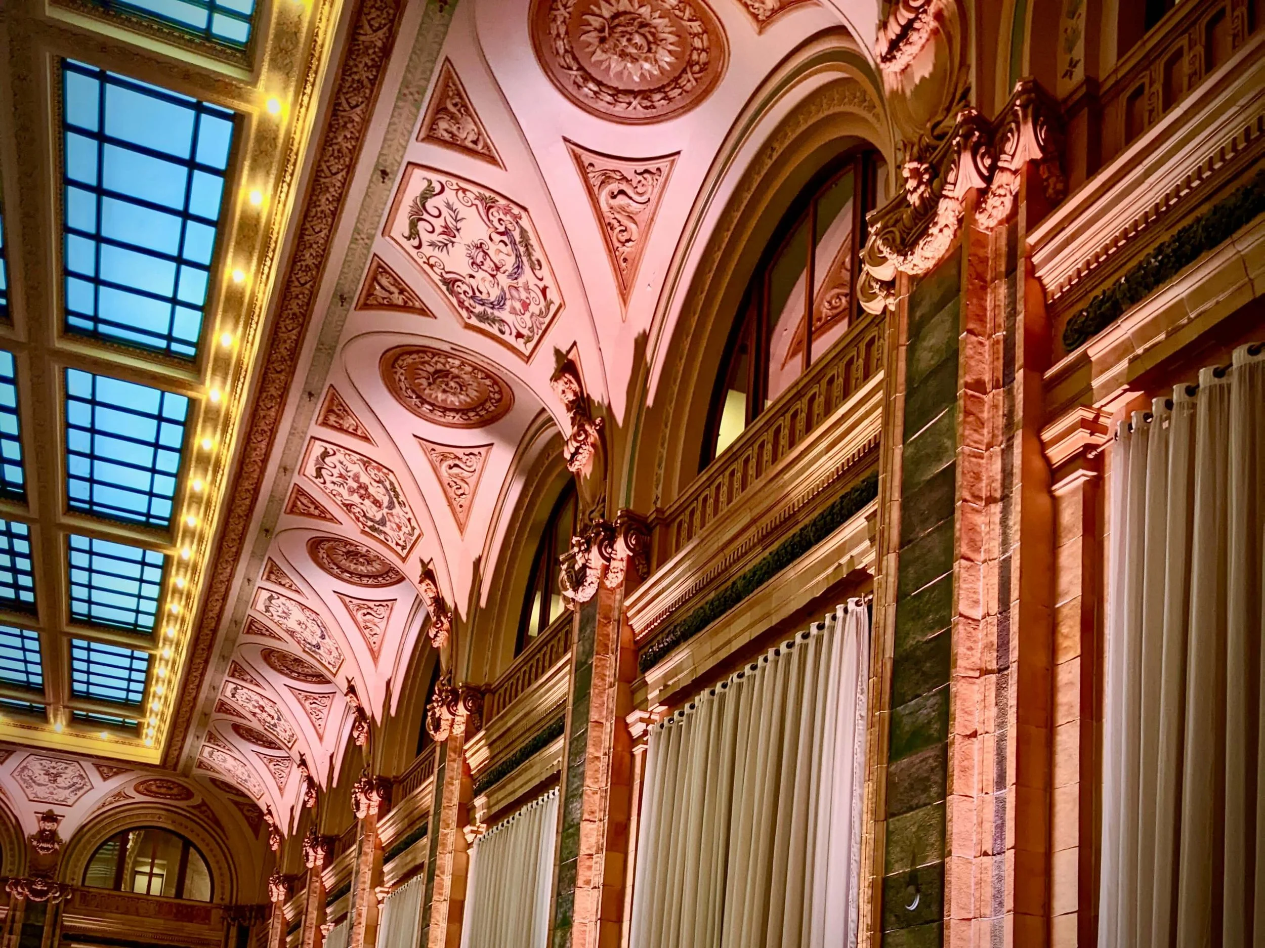 Architectural uplighting highlighting decorative walls at a Pittsburgh event at the Pennsylvanian