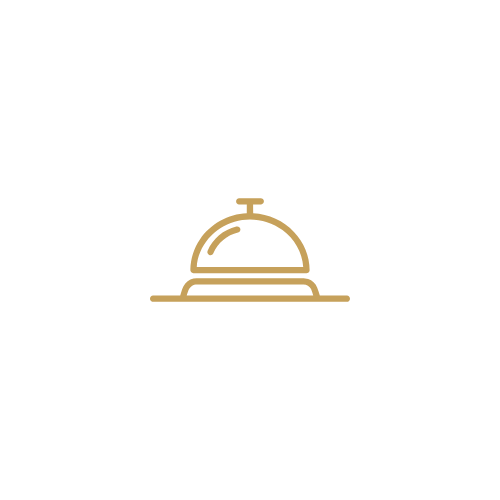 Gold color service bell on a black background.