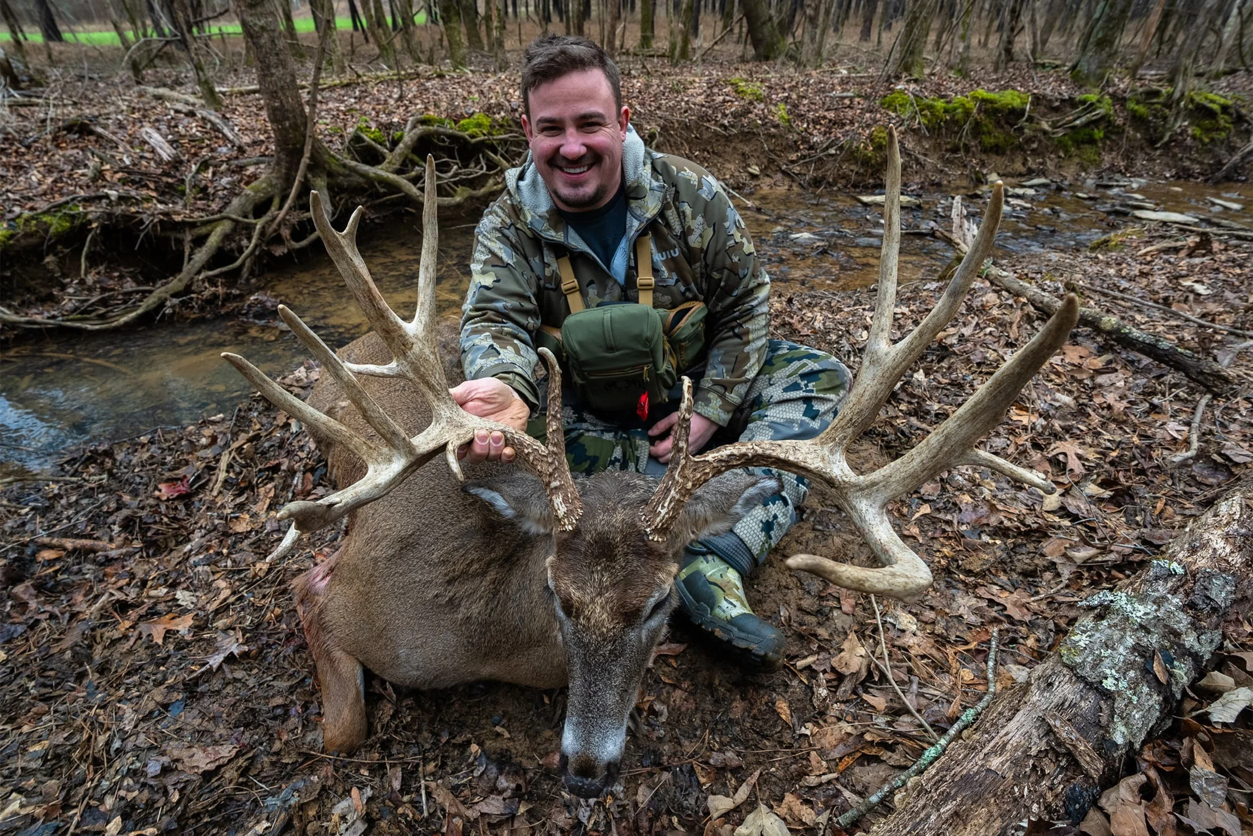 Hunter with trophy whitetail deer at Stouts Mountain Ranch