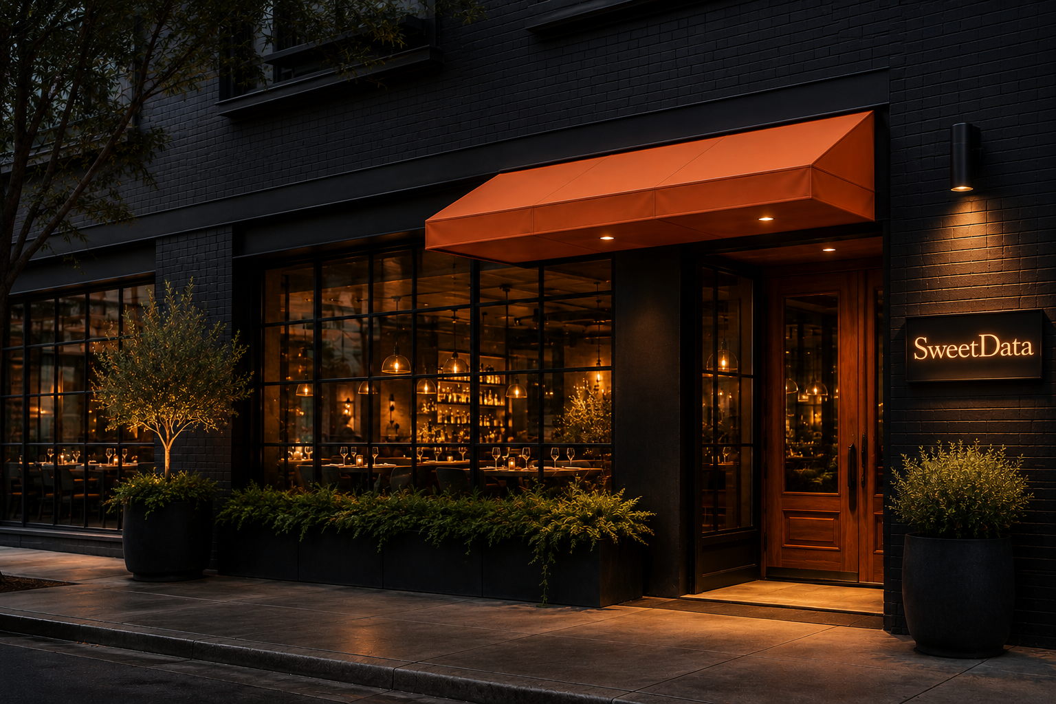 Exterior view of a restaurant named 'SweetData' with a black brick facade, large glass windows showing a warm-lit interior with hanging lights, and potted plants outside at dusk.