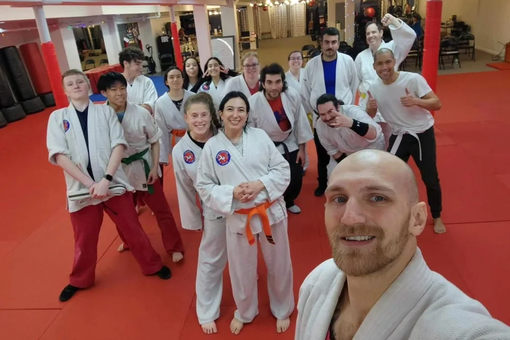 The adult American Jiu-Jitsu class on the mat at Metrowest Academy in Natick