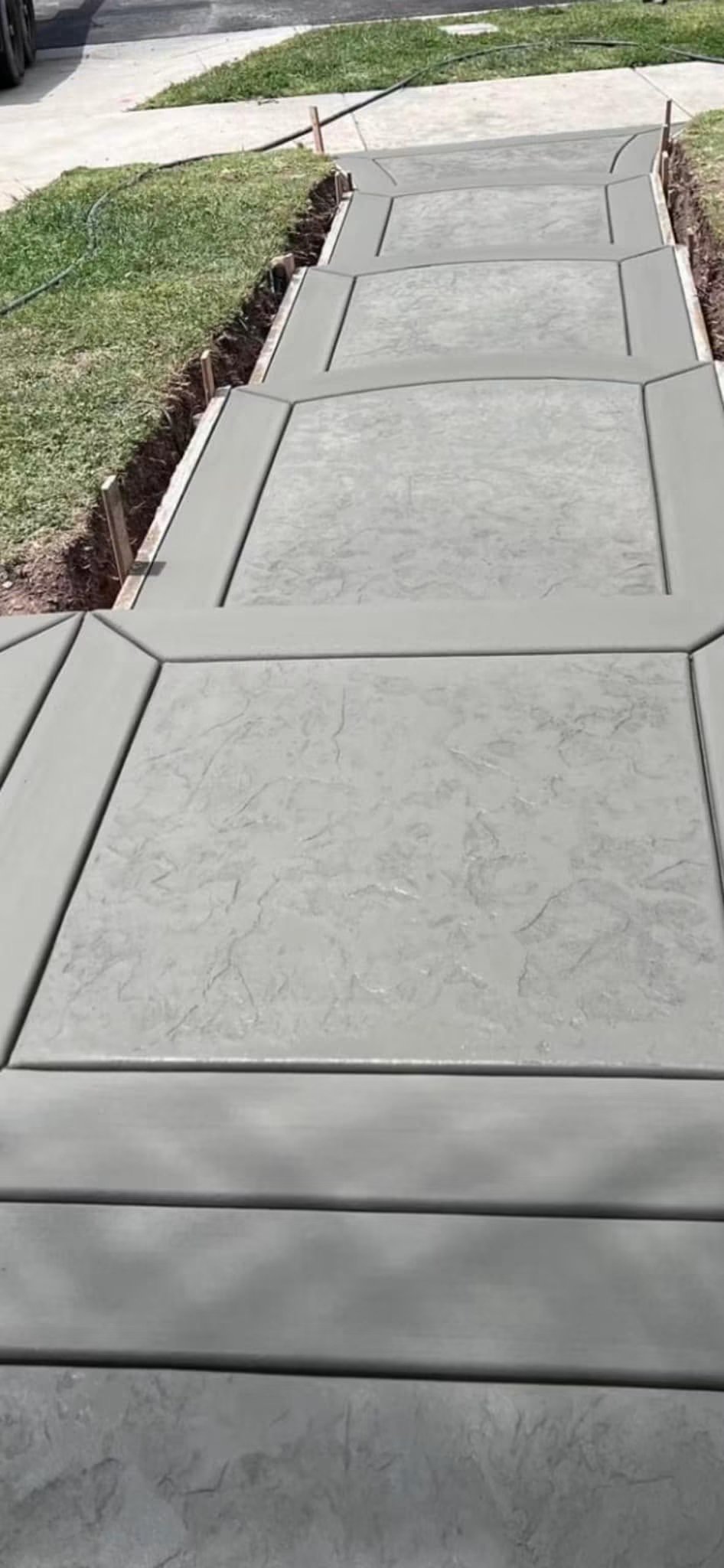 Love the elevate look of this sidewalk! Decorative work completed by one of our trusted trade partners.