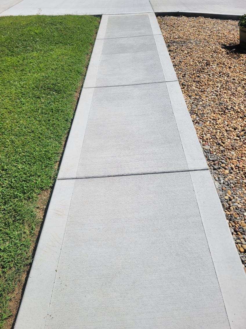 Removed Exposed Aggerate Pea Gravel side walk and pour new concrete walk.  