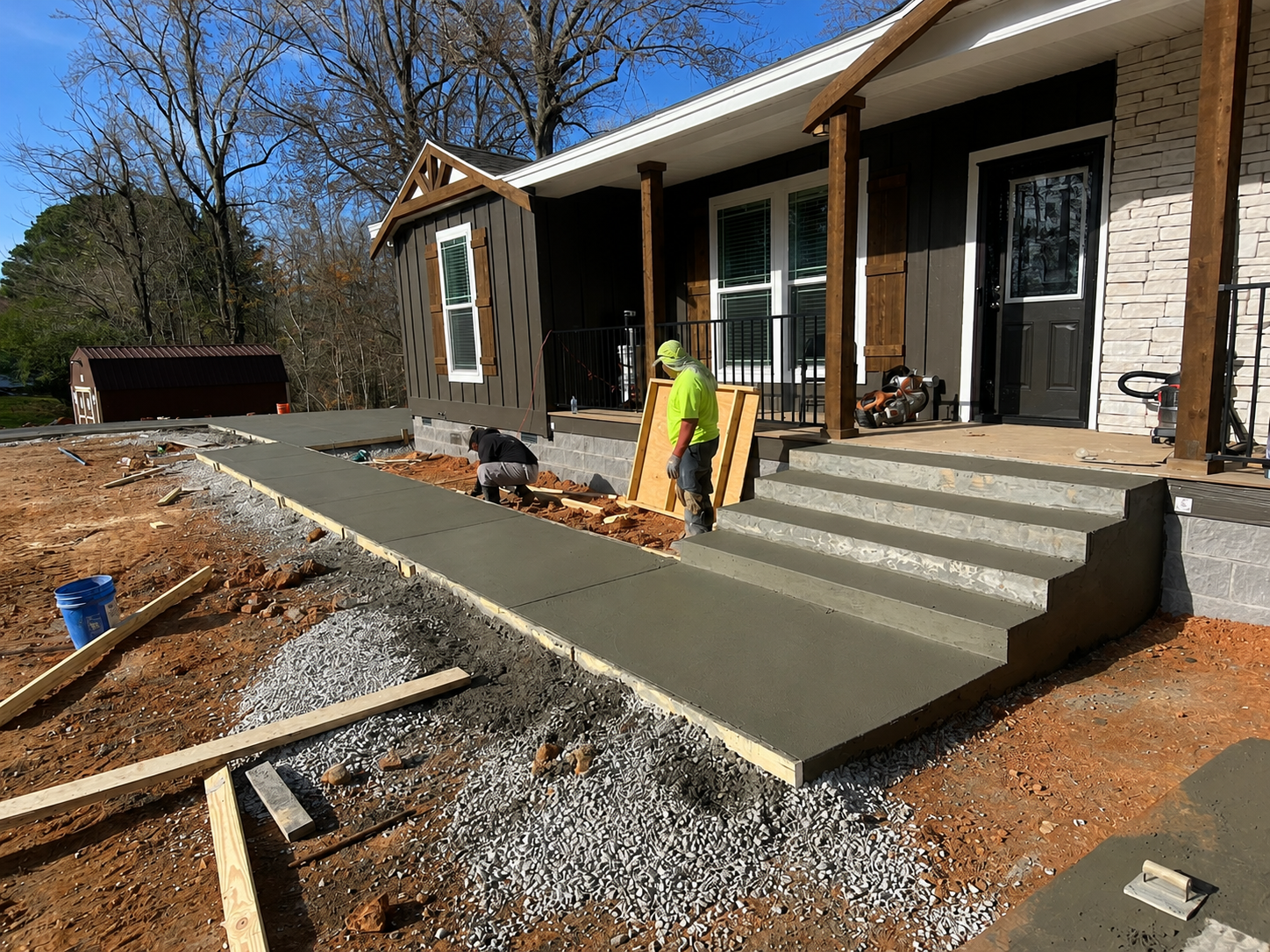 Added stairs and sidewalk to a new build.