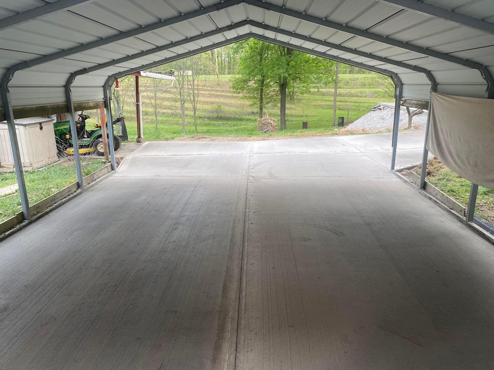 Part of a large driveway project where we fixed elevation and water re-direction. Added this under their carport for a seamless finish. 