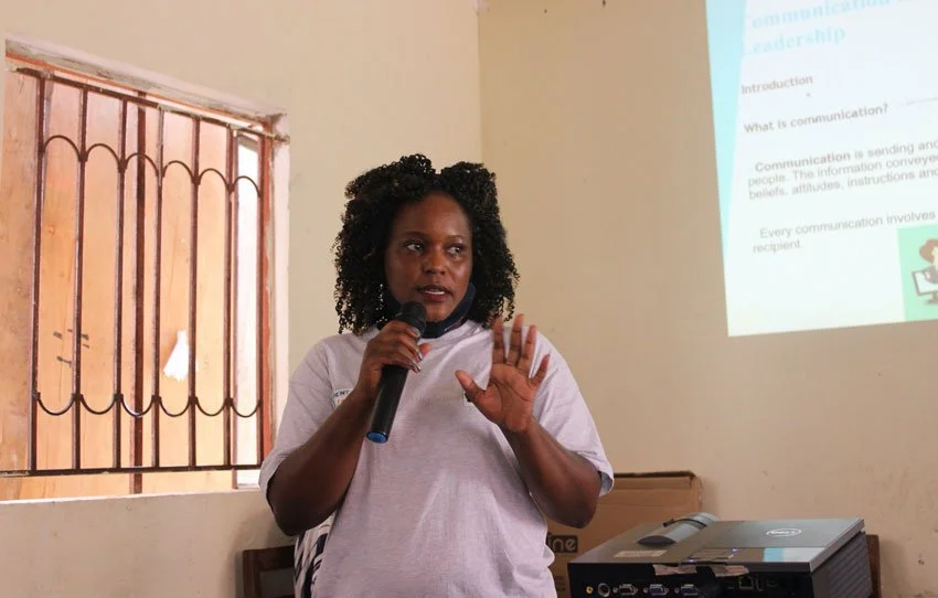 Ms. Carl Ayesiga taking the students through leadership and communication skills.