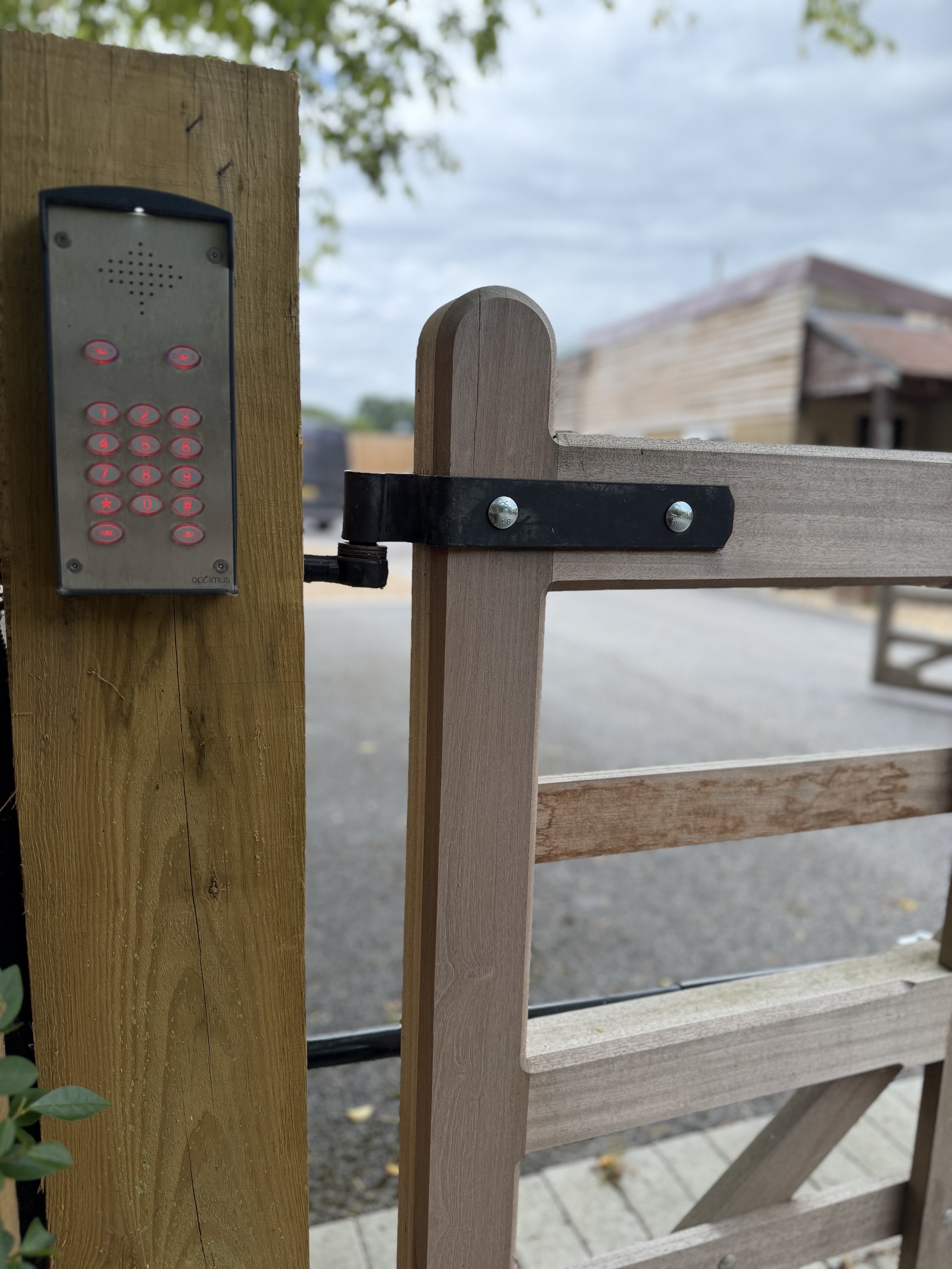 Access control keypad mounted on a timber gate post