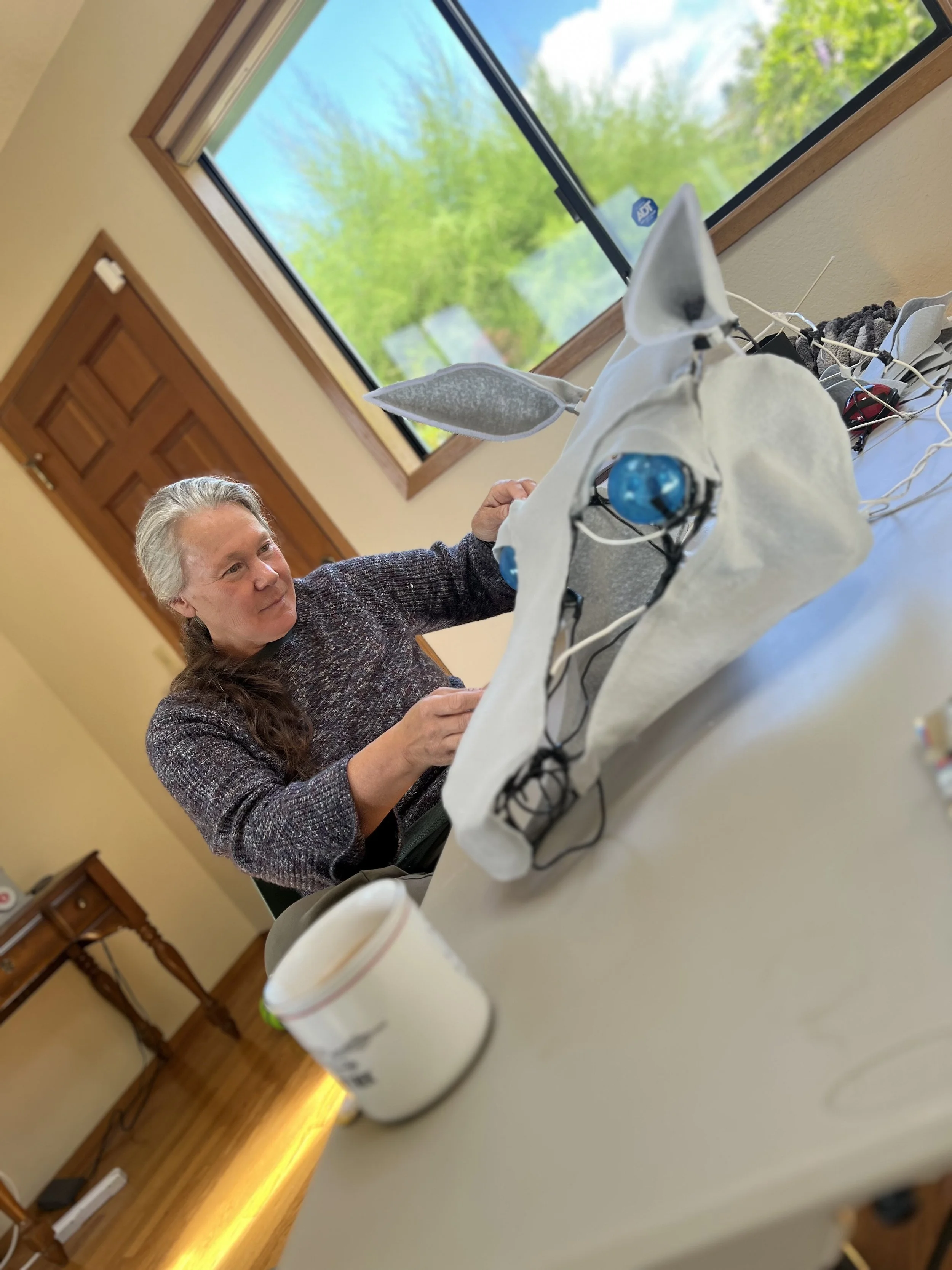 Working on a horse puppet for a theater show