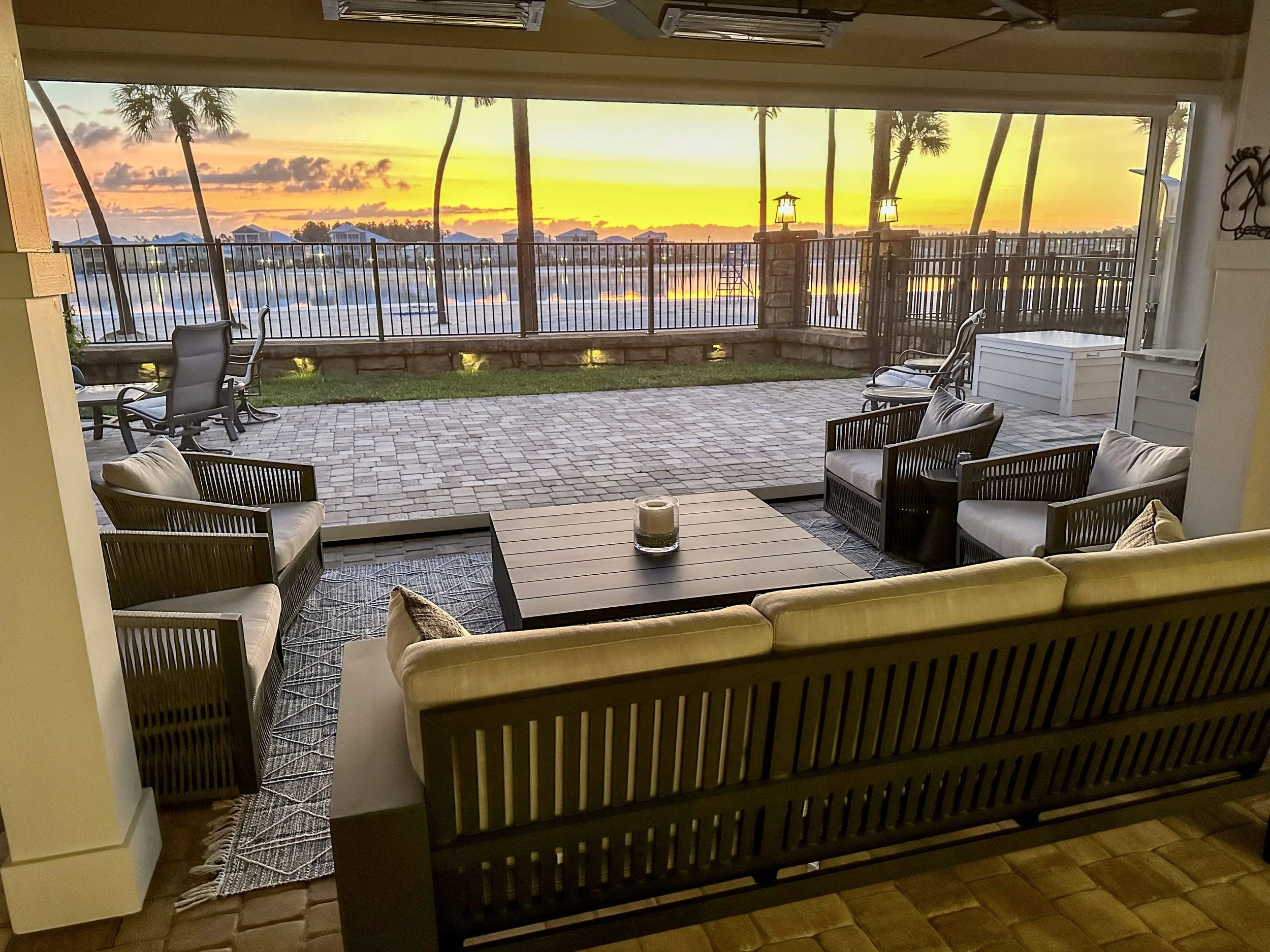 Expanded lagoon-front lanai with sunset views, outdoor seating and direct access to Beachwalk Crystal Lagoon