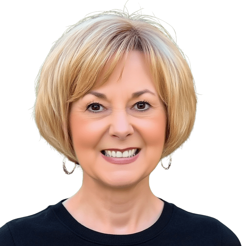 Headshot of a middle-aged woman with short blonde hair, smiling, wearing a black top and hoop earrings.