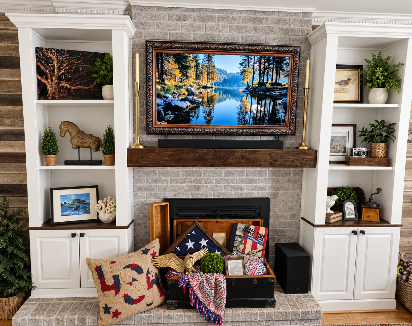 Fireplace and built-in shelves styled with framed landscapes, greenery, vintage accents, and Americana décor.