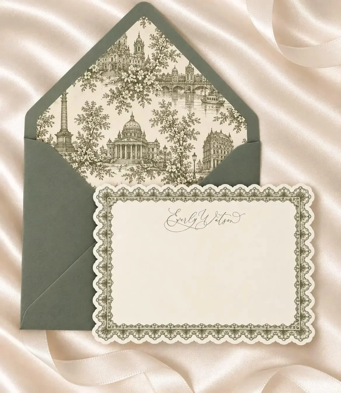 An artful touch for the art of correspondence. 🤍

From the scalloped edges to the intricate olive-green detailing and vintage toile envelope liner, every element is designed to make your stationery feel truly one of a kind.

Because the most beautif