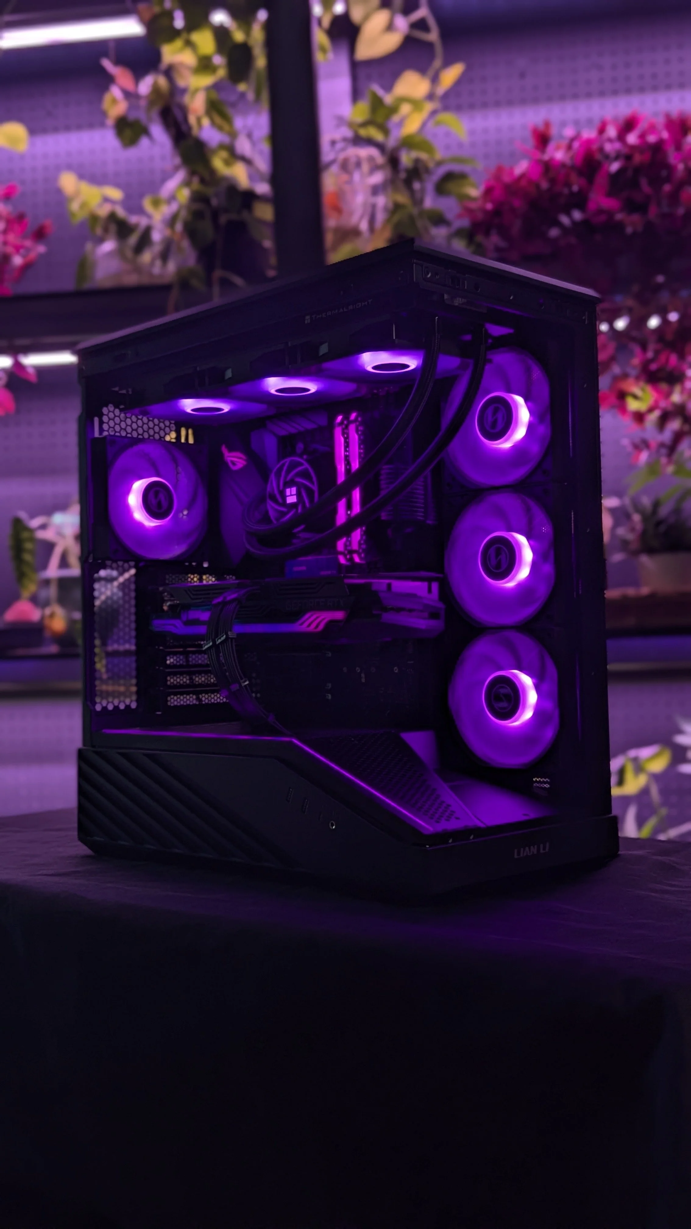 EmberCore PCs purple RGB gaming build with tempered-glass side panel