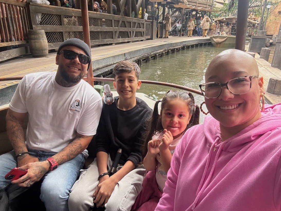 A family helped by Mother's Grace, together on a boat ride
