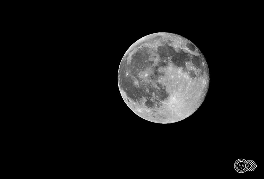 Full moon in a dark night sky.