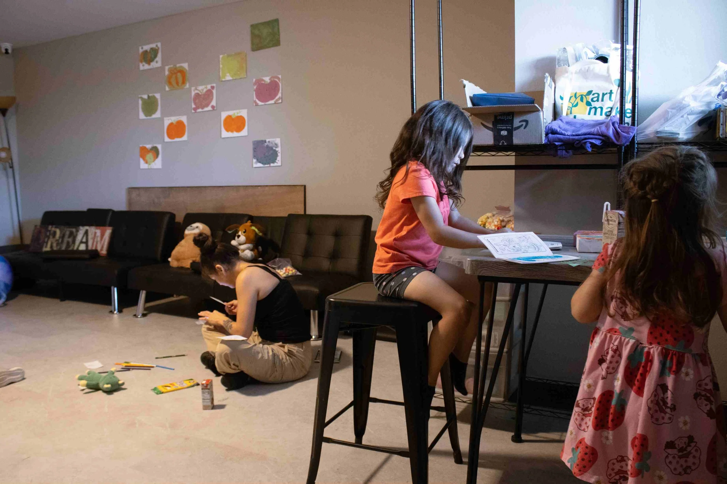refuge kids play in family room