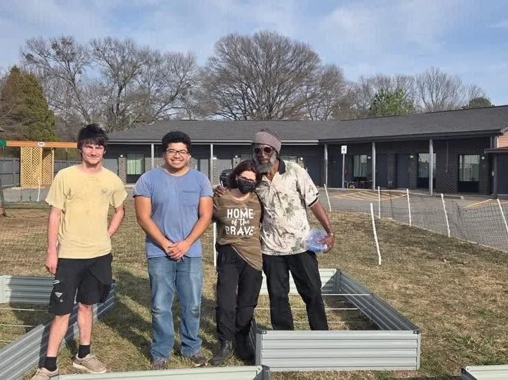 refuge-group-photo-outside.jpg