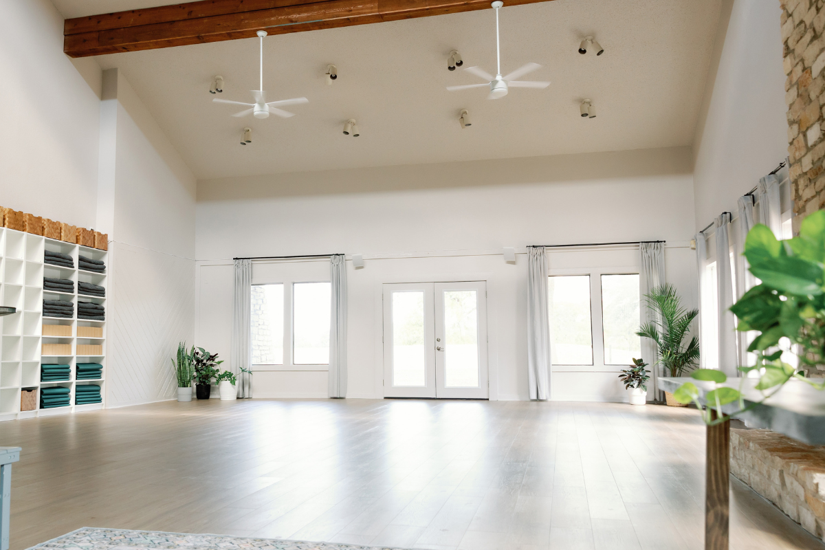 Gorgeous, light filled yoga studio space with panoramic views of the greenbelt to practice yoga in Northwest Austin