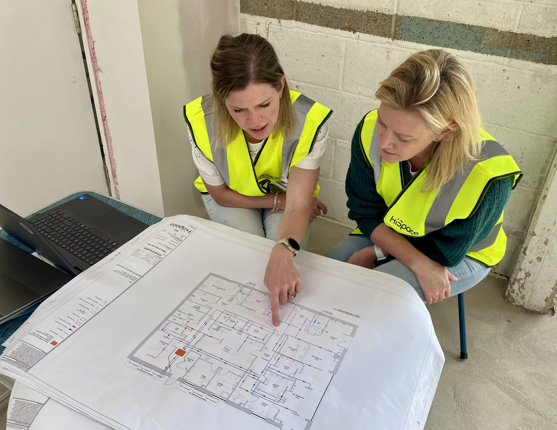 Hilary and Lizzie reviewing the plans for their new Ottie & George Vets practice in Thame