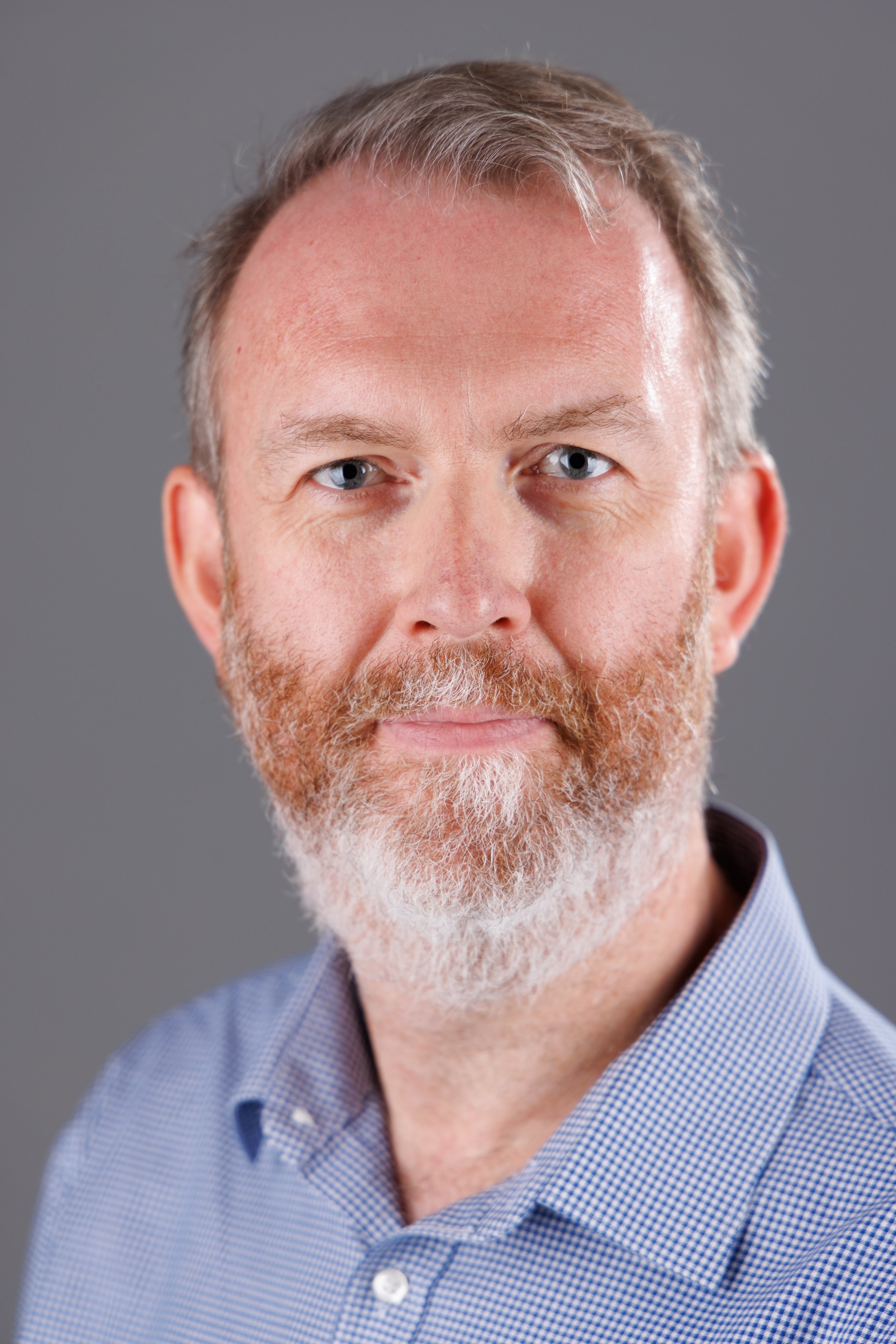 A headshot of Damien Jarvis