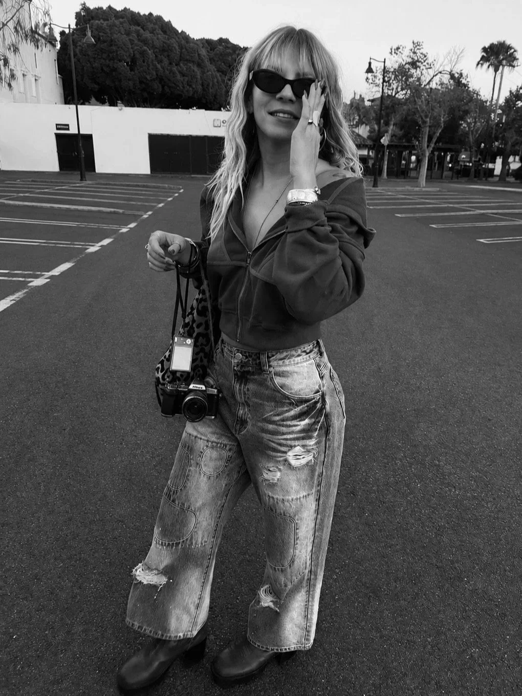 Noel Hailey, founder of GOOD SIDE, with her cameras.