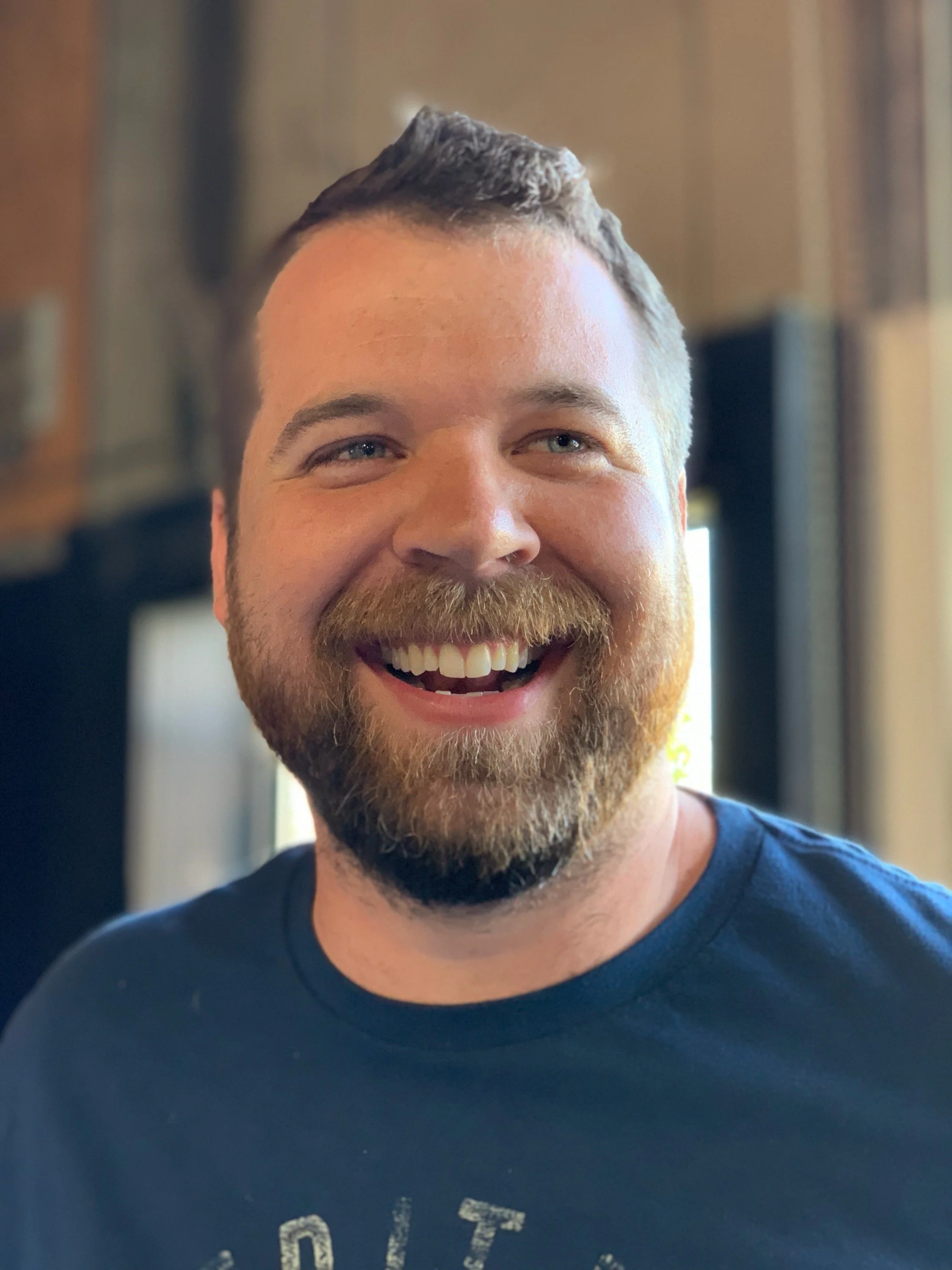 Smiling bearded man