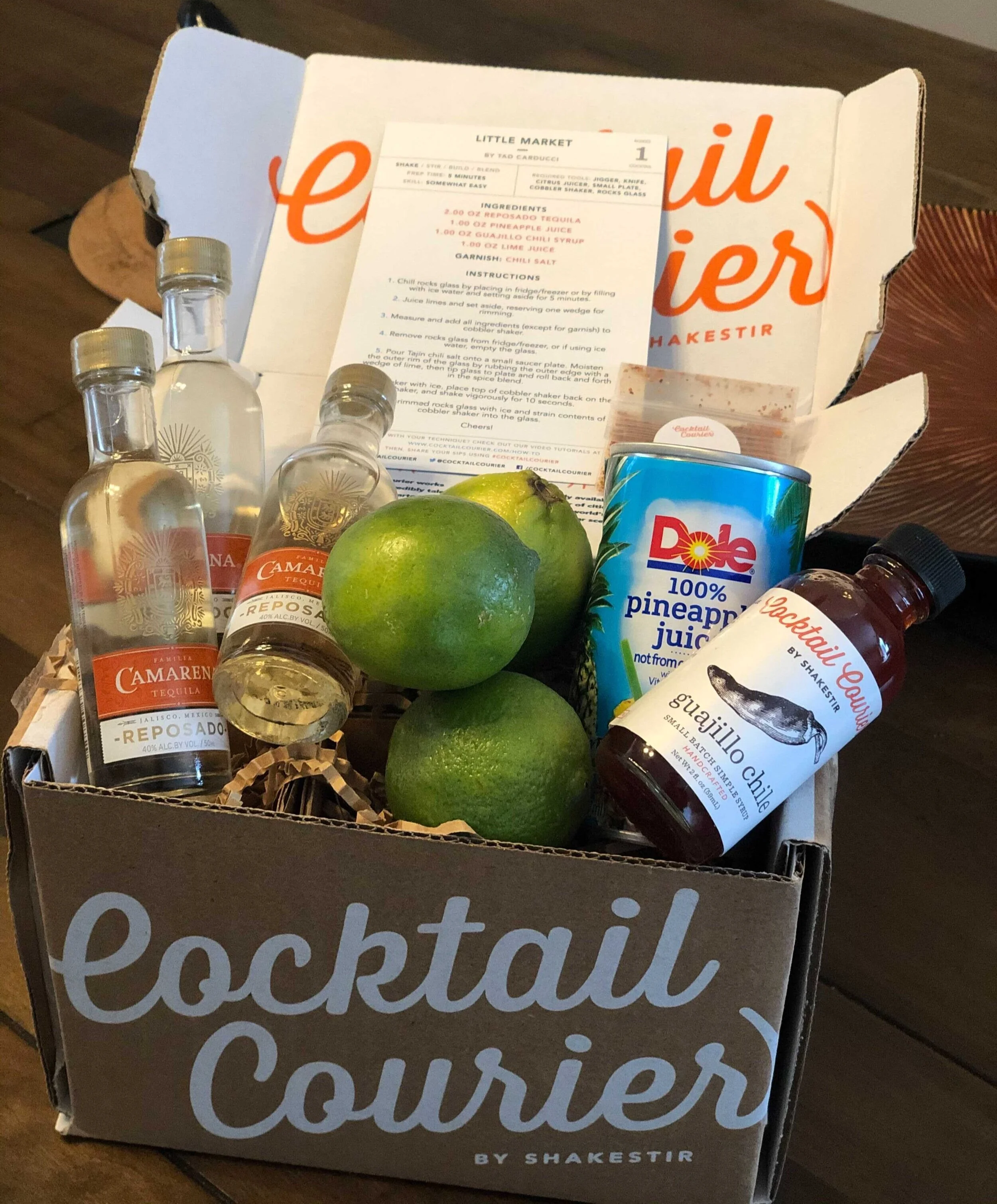 The Little Market cocktail kit arrives to a guest with fresh, fruity, spicy ingredients
