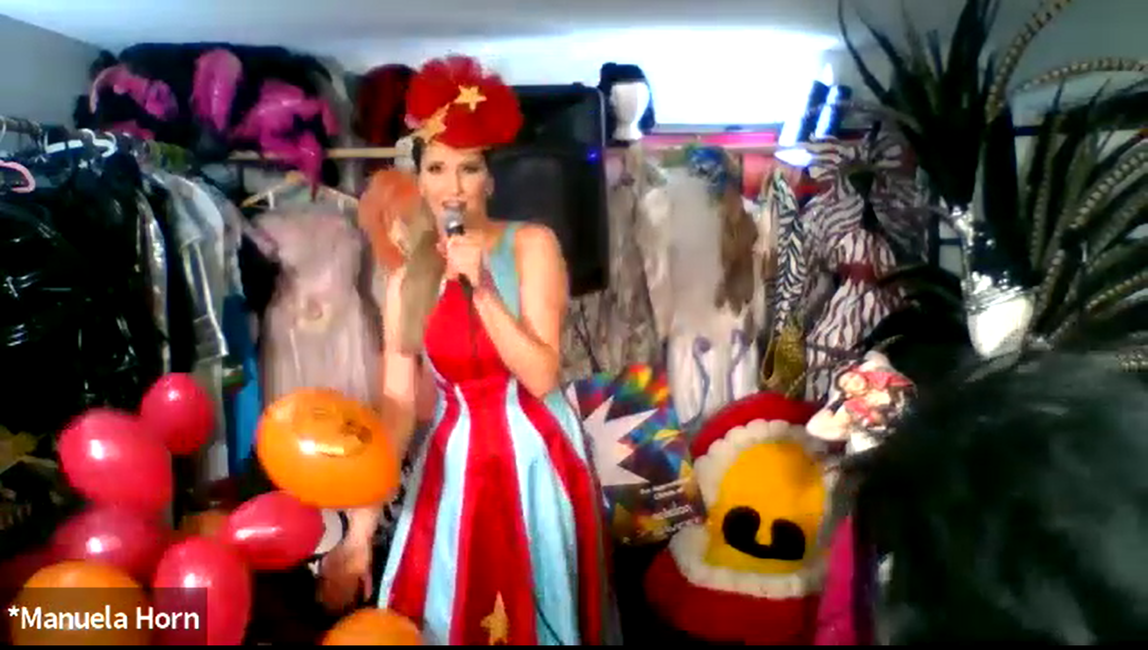 “Checked off the list - Gorilla with a leaf blower and balloons :)” Manuela Horn sings 99 Luftballons while person in a gorilla costume dances and moves balloons about the room