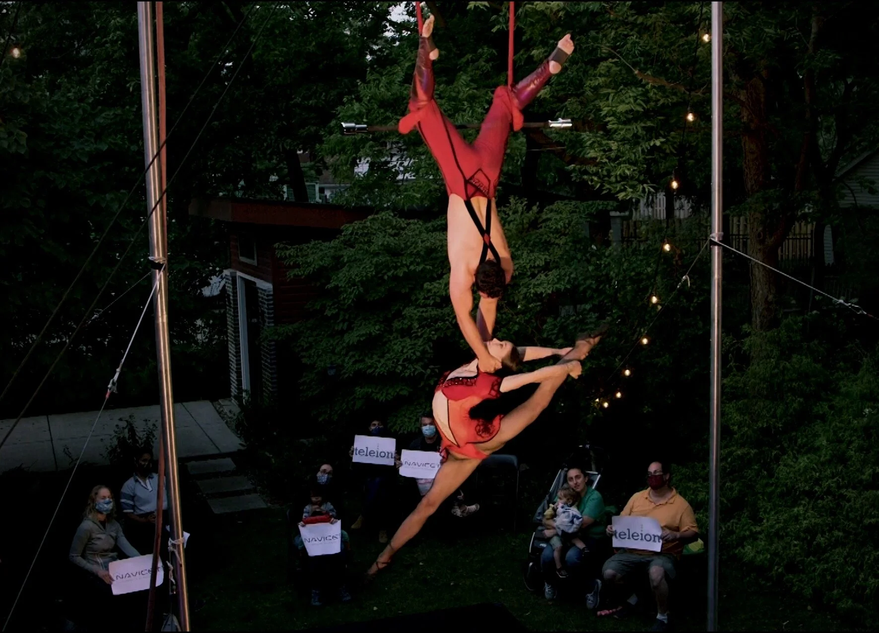 “Impressive!” “I love the mama hugging her child in the yard, watching with big eager eyes” ”They are amazing!” Duo Rose show us how to hold and balance while doing a split, by the neck