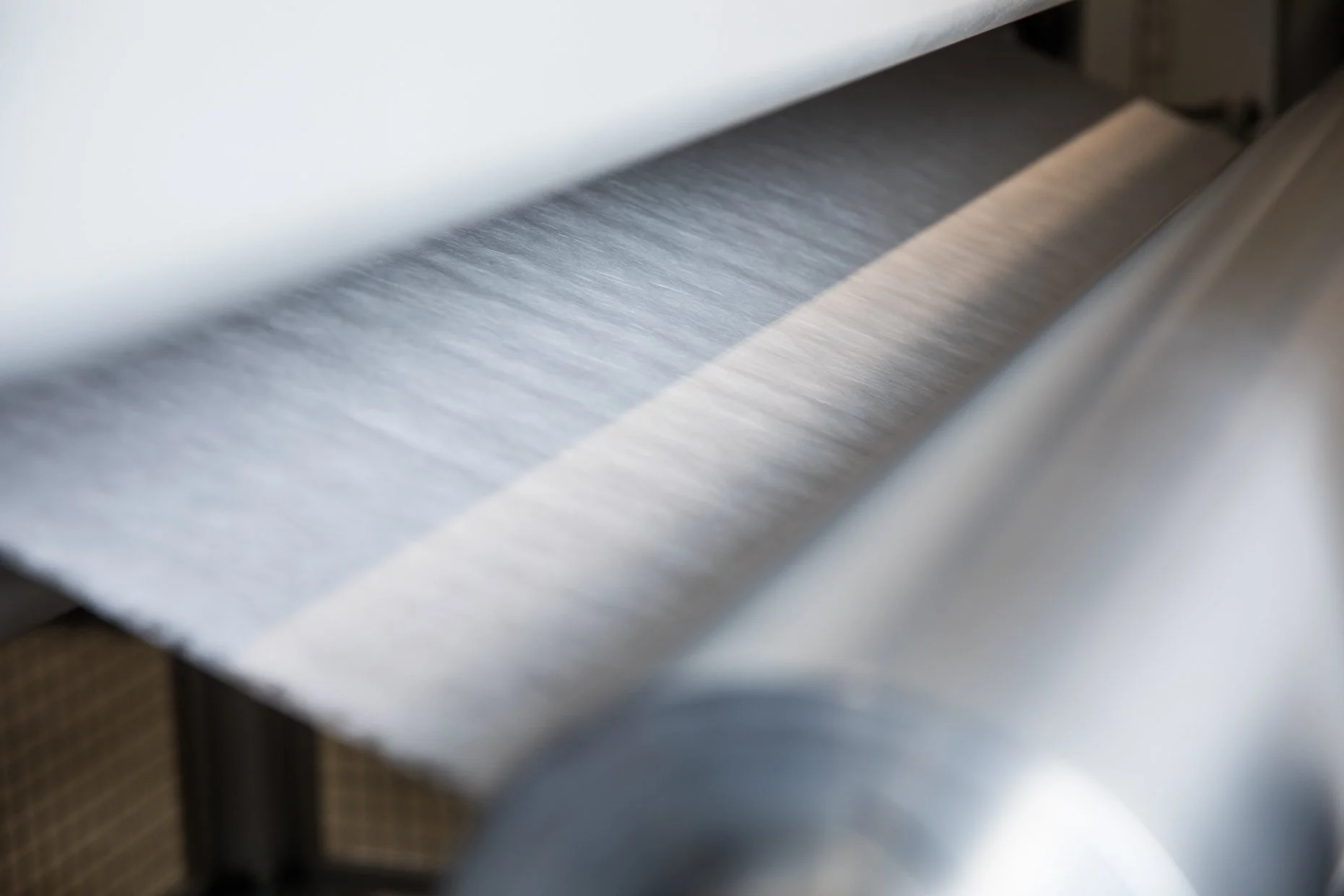 Close-up of a metallic surface, likely part of a machine or industrial equipment.