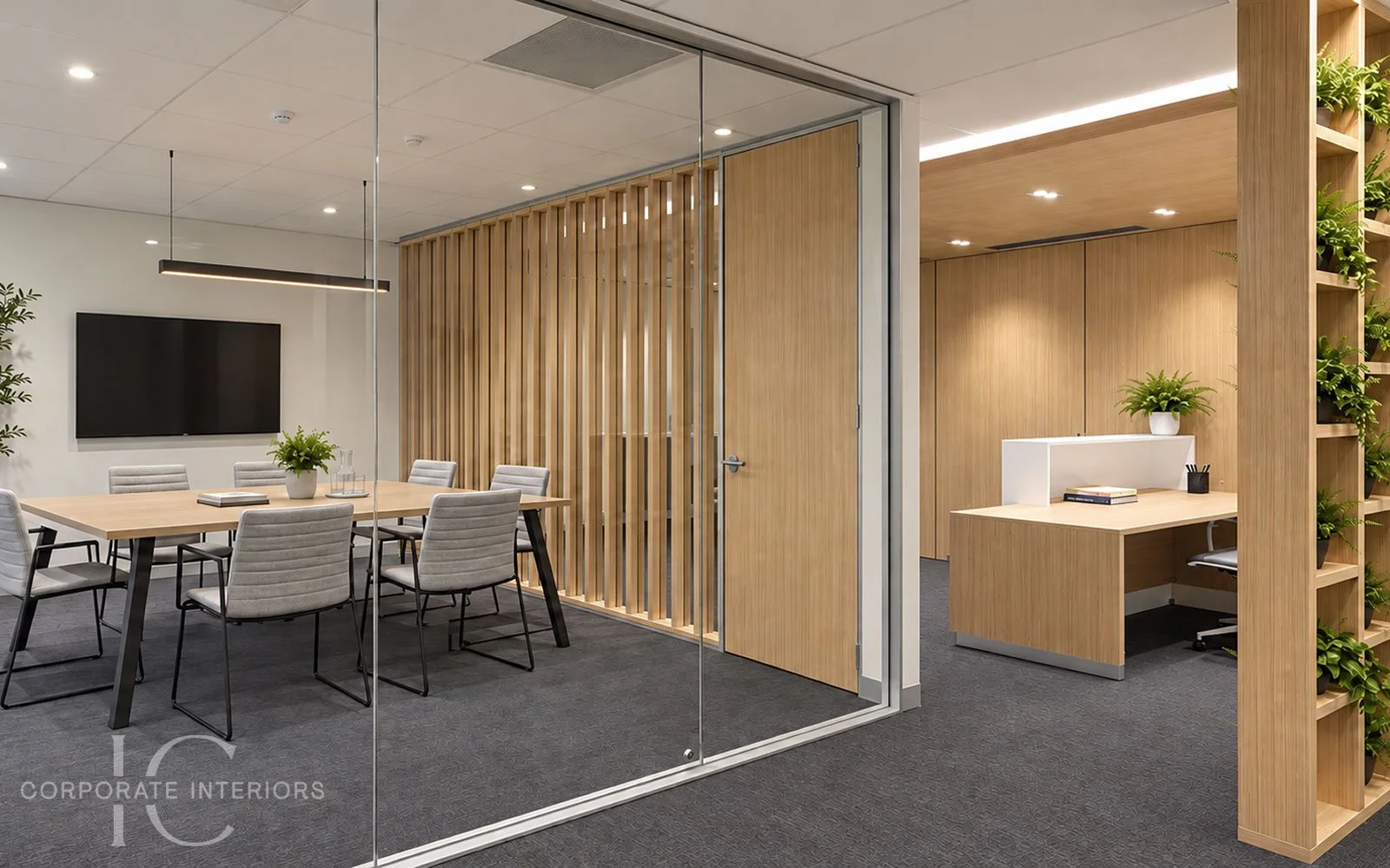 Floor-to-ceiling glass office partitions enclosing a meeting room in a Melbourne office