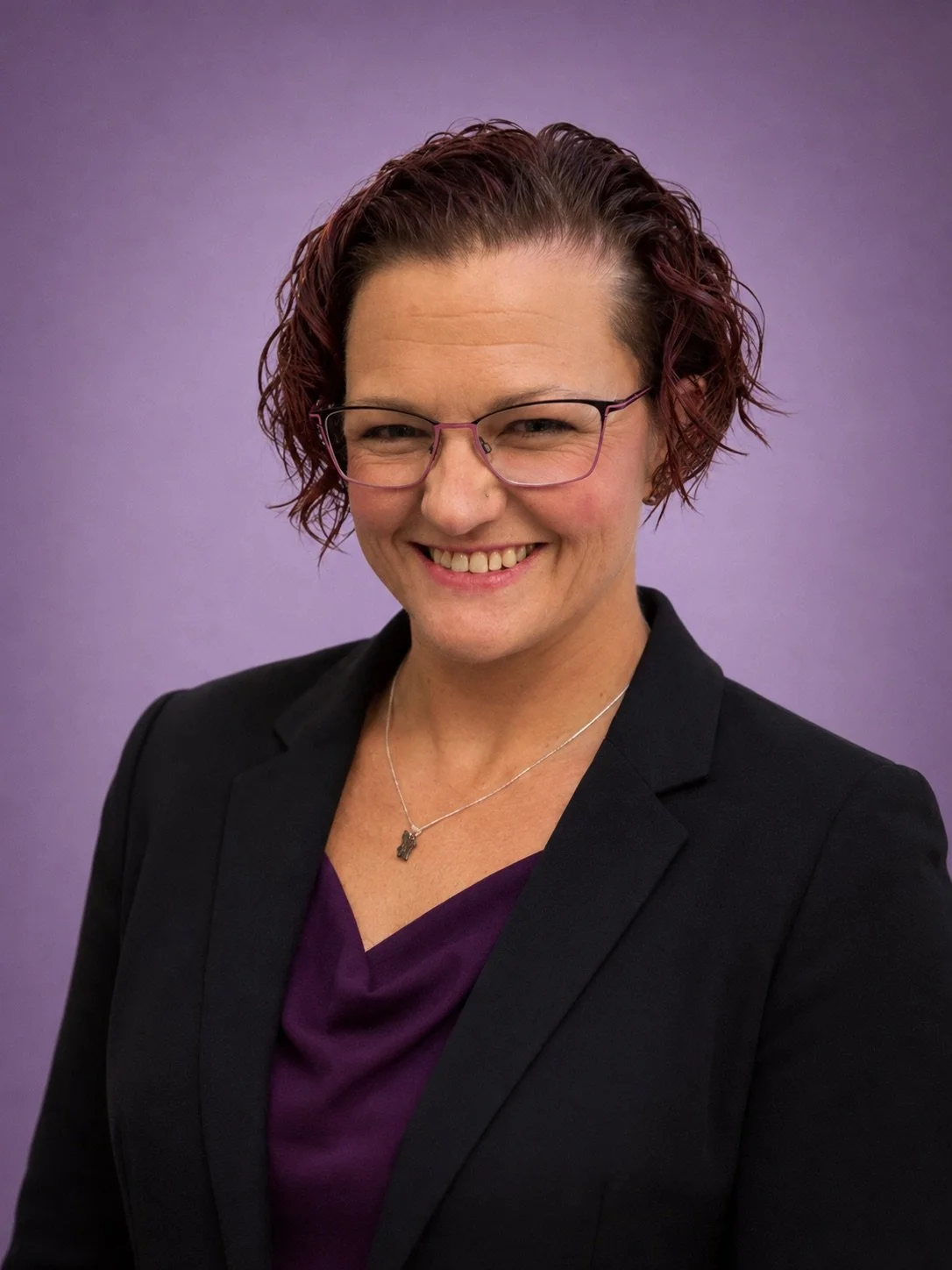 A photo in a headshot style of Rebecca Carpenter, LCSW