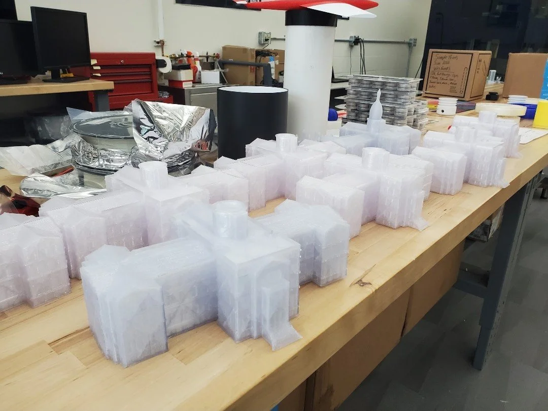 Mass production of 3D-printed Michigan State Capitol building models designed by wesbanks and arranged after fabrication