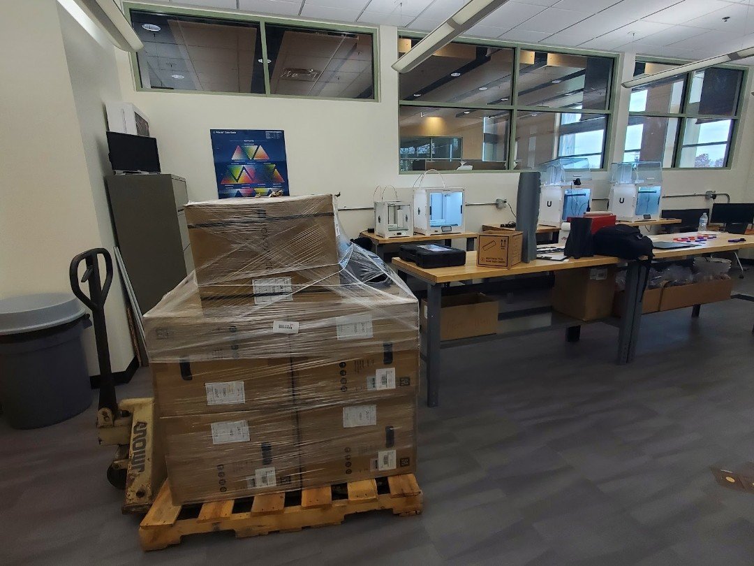 F-104 Lab at Western Michigan University showcasing new shipment of 3D printers
