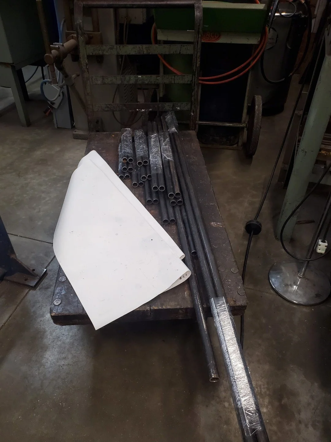 Fabrication materials prepared for machining, welding, and assembly into a custom automotive roll cage