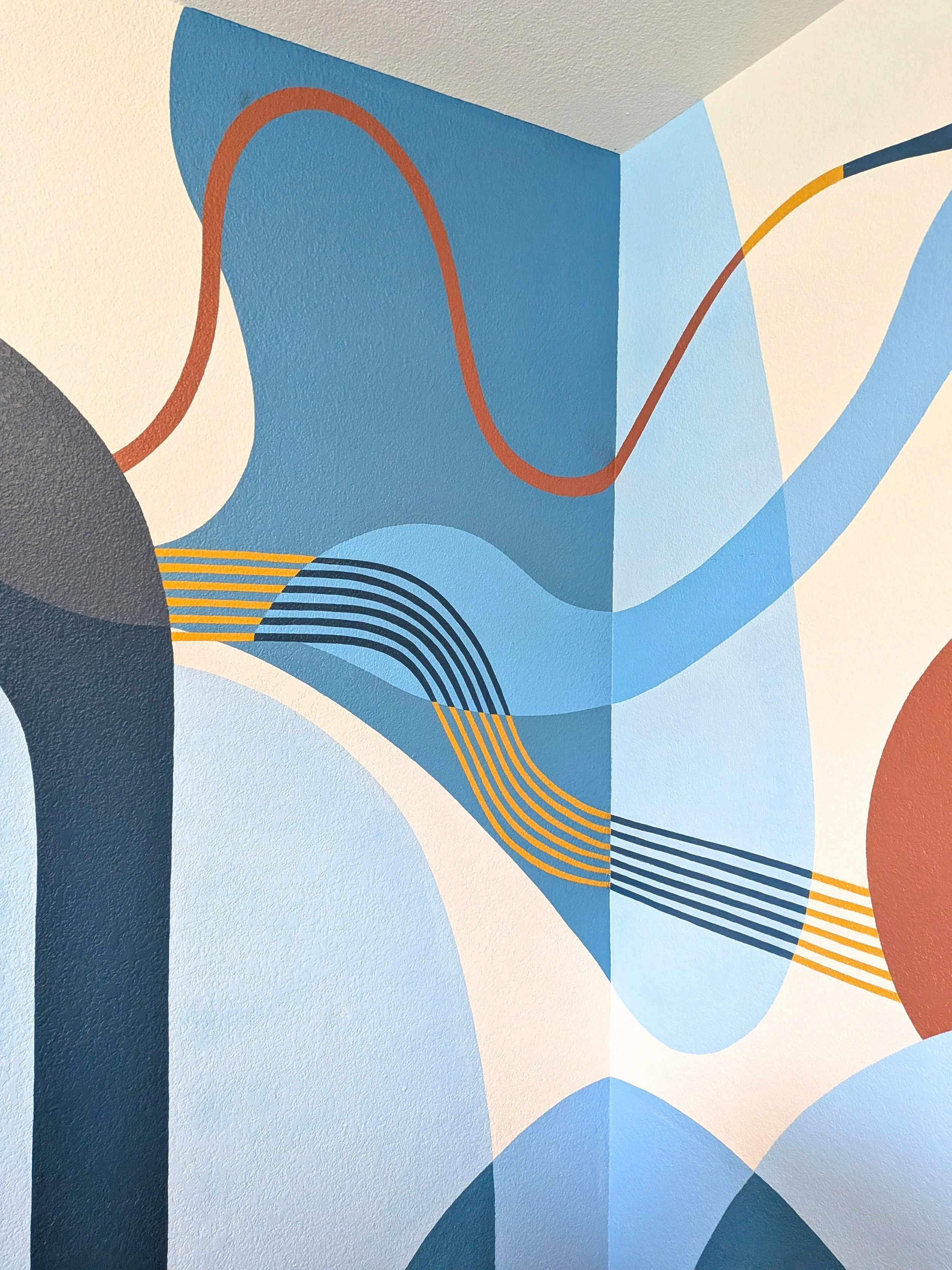 Buda, Texas playroom mural featuring bold abstract artwork designed to work with the room's existing architecture.